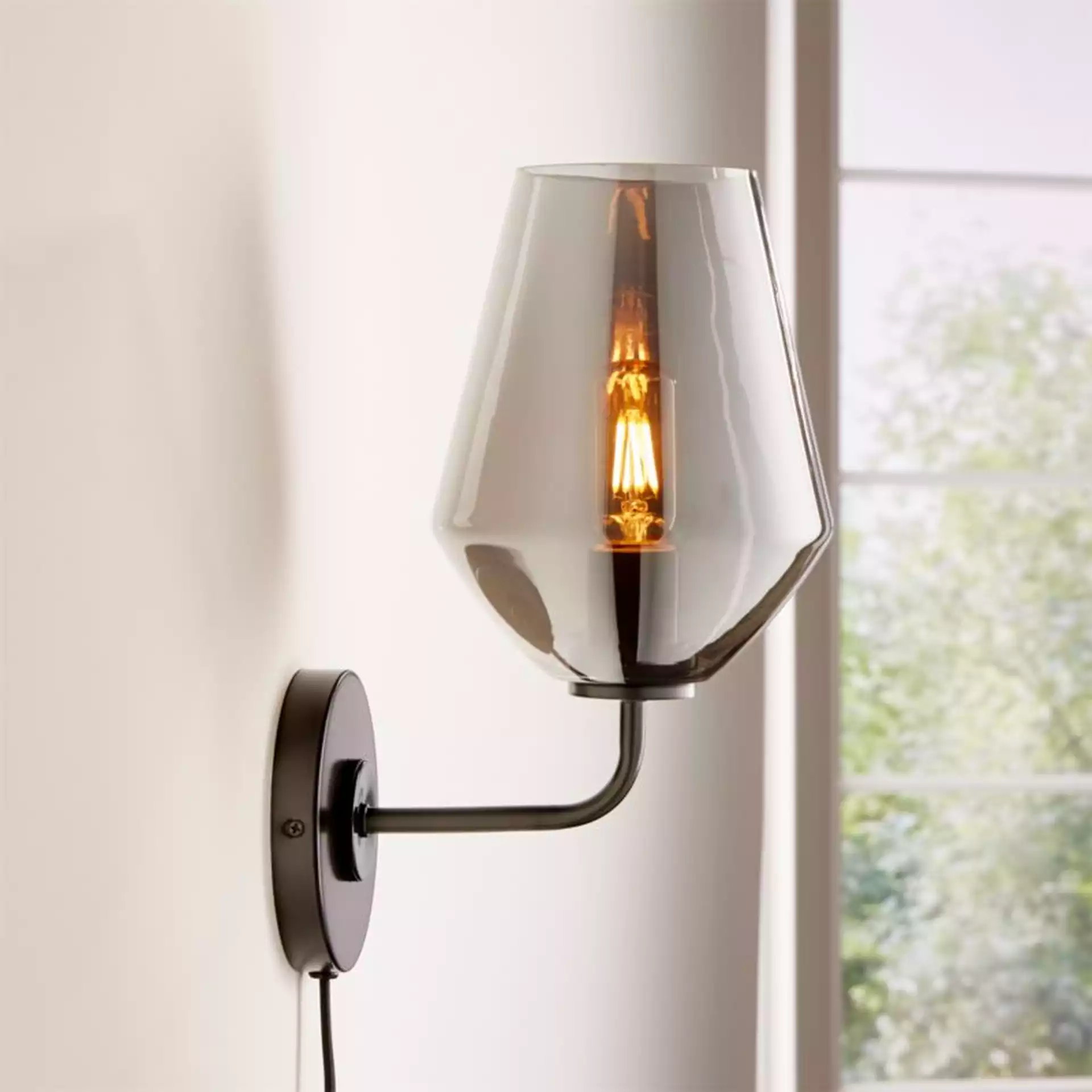 Arren Black Wall Sconce with Clear Angled Shade
