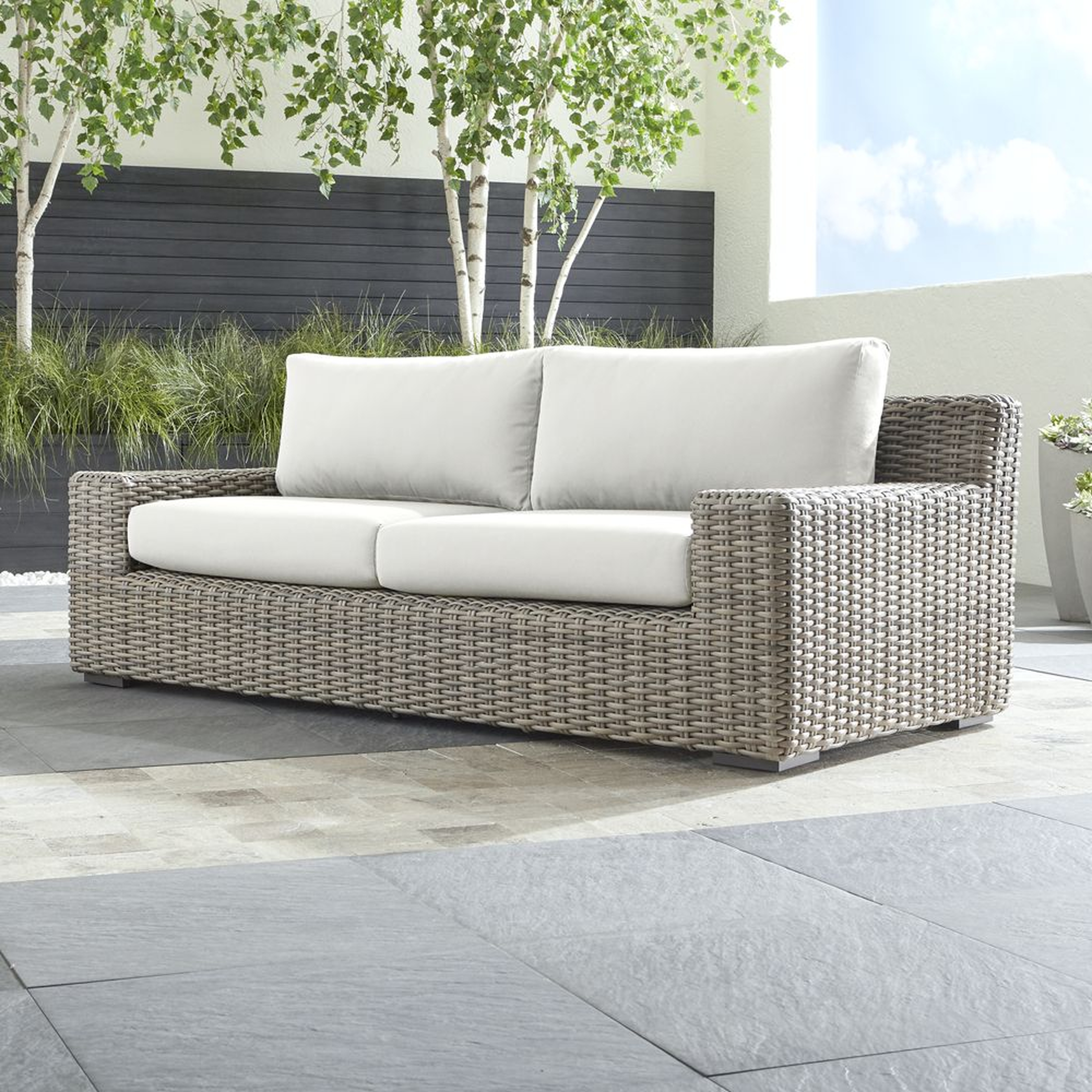 Cayman Outdoor Sofa with White Sand Sunbrella ® Cushions - Crate and Barrel
