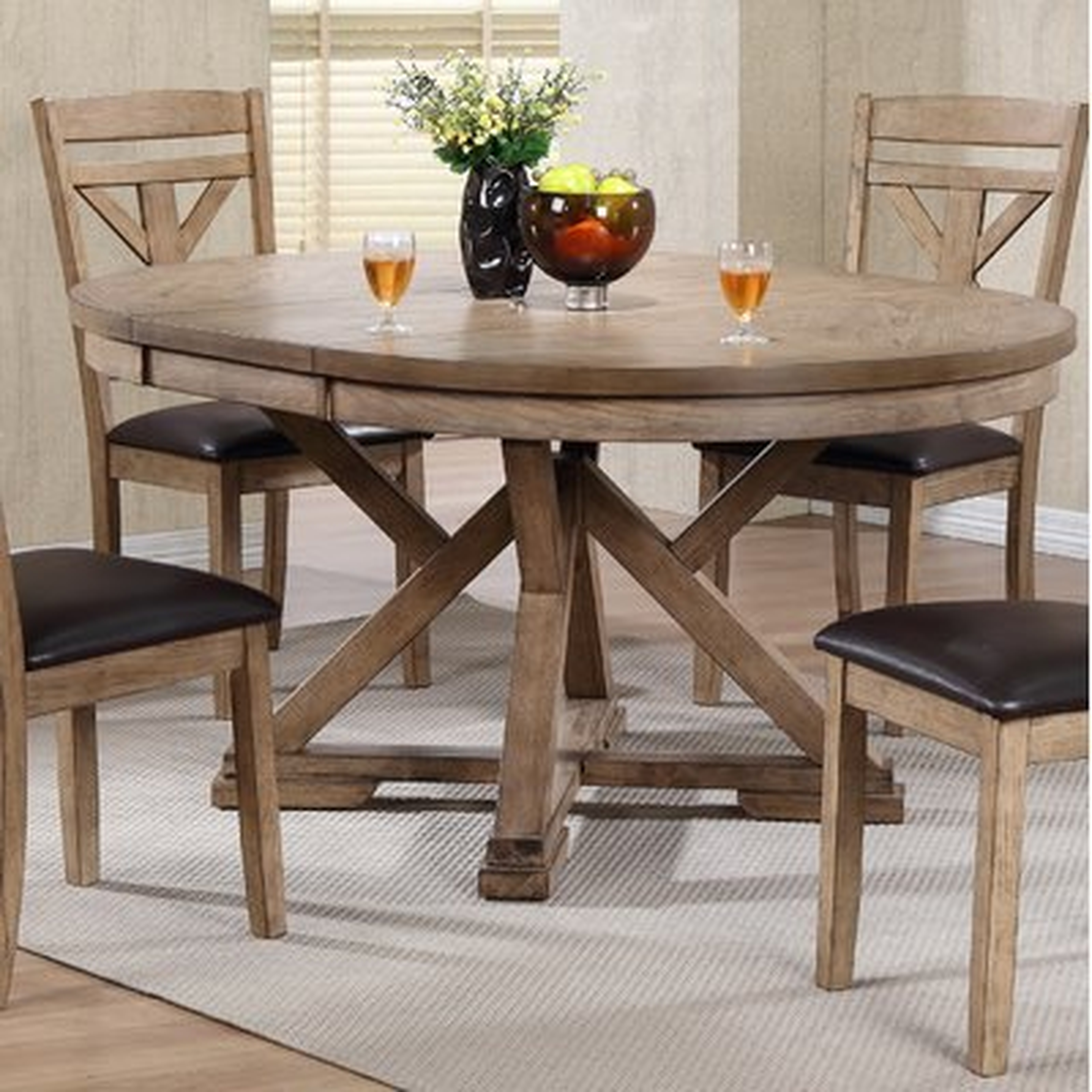 Carnspindle Round Butterfly Leaf Dining Table - Wayfair