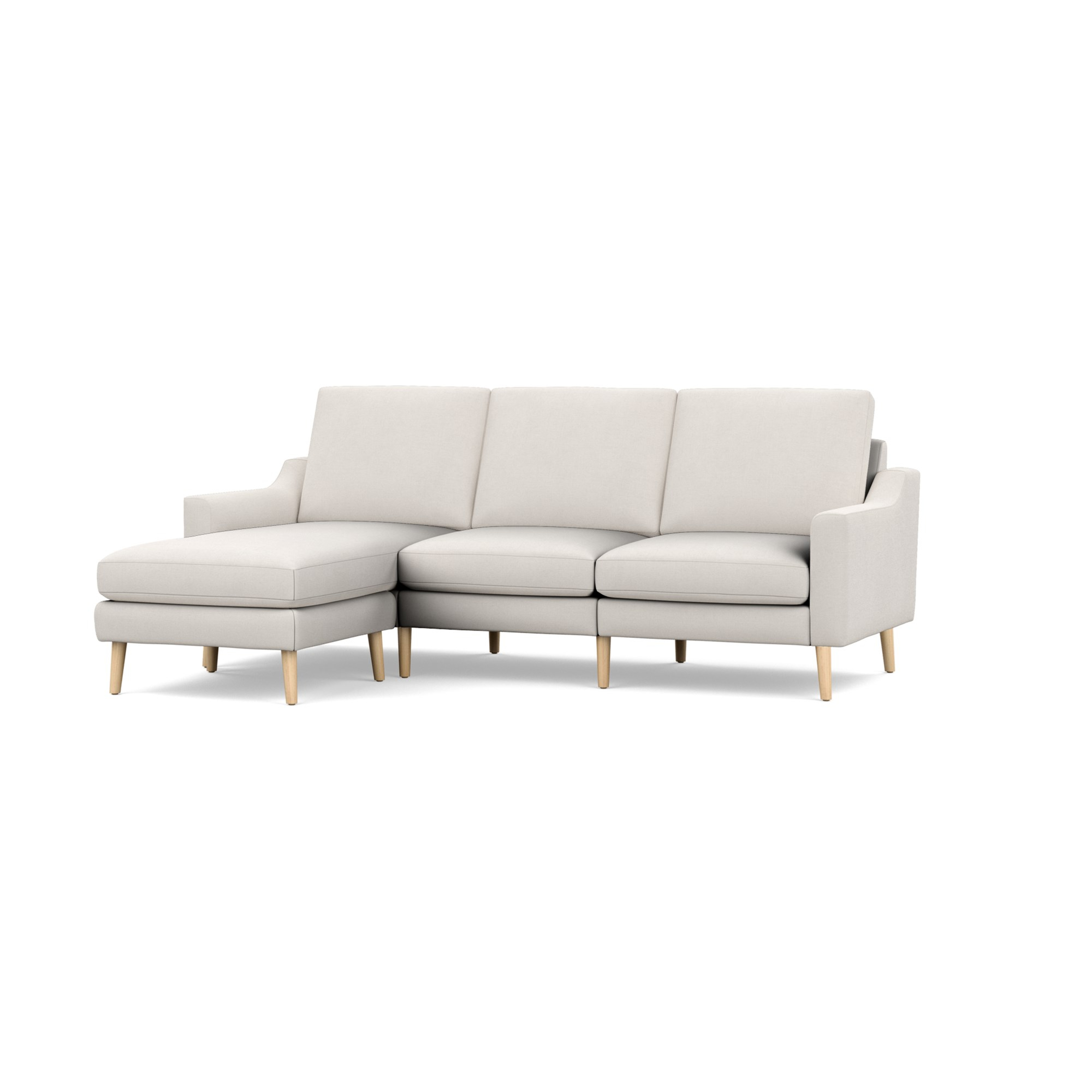 Nomad Sofa Sectional in Ivory, Leg Finish: OakLegs - Burrow