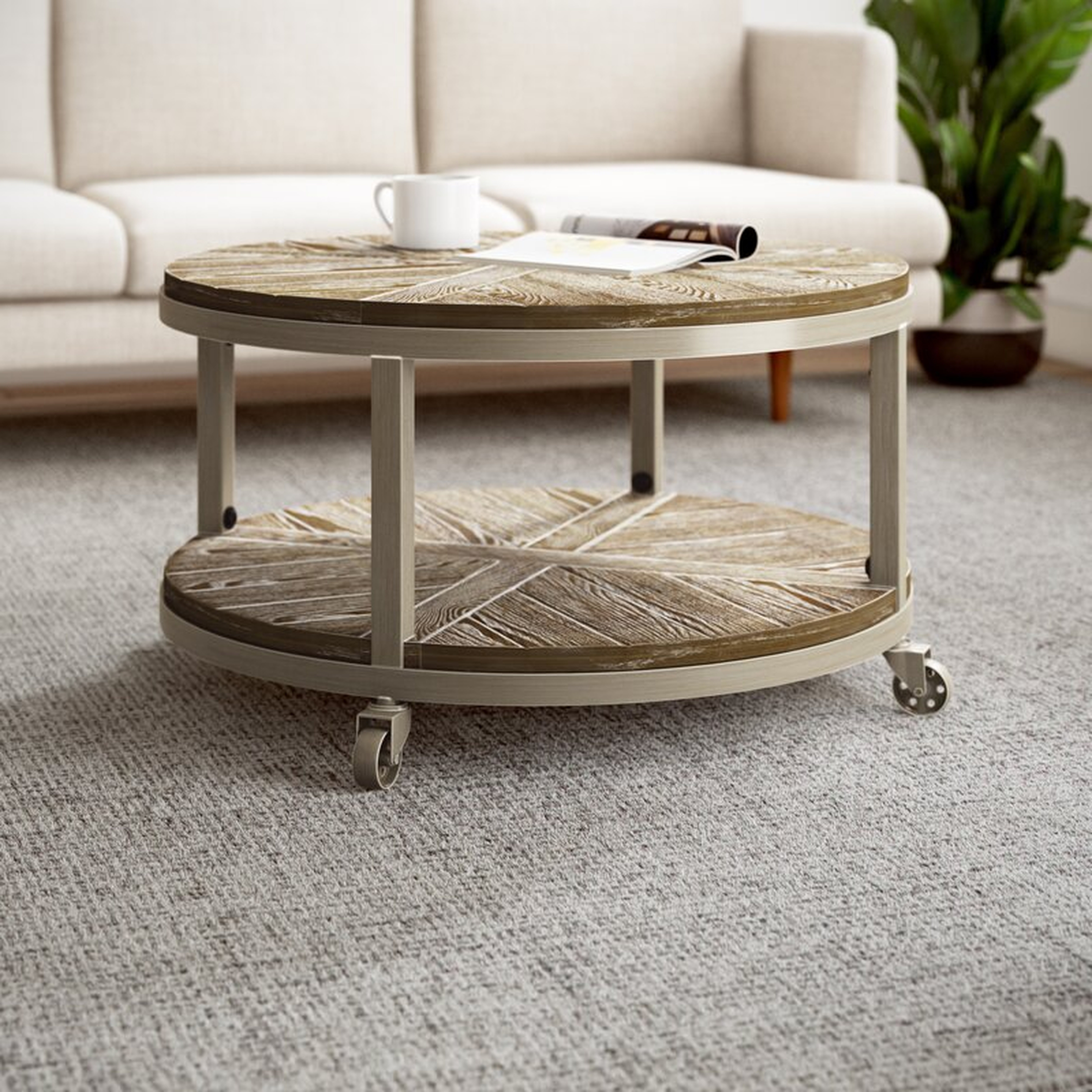 Brien Wheel Coffee Table with Storage - Wayfair