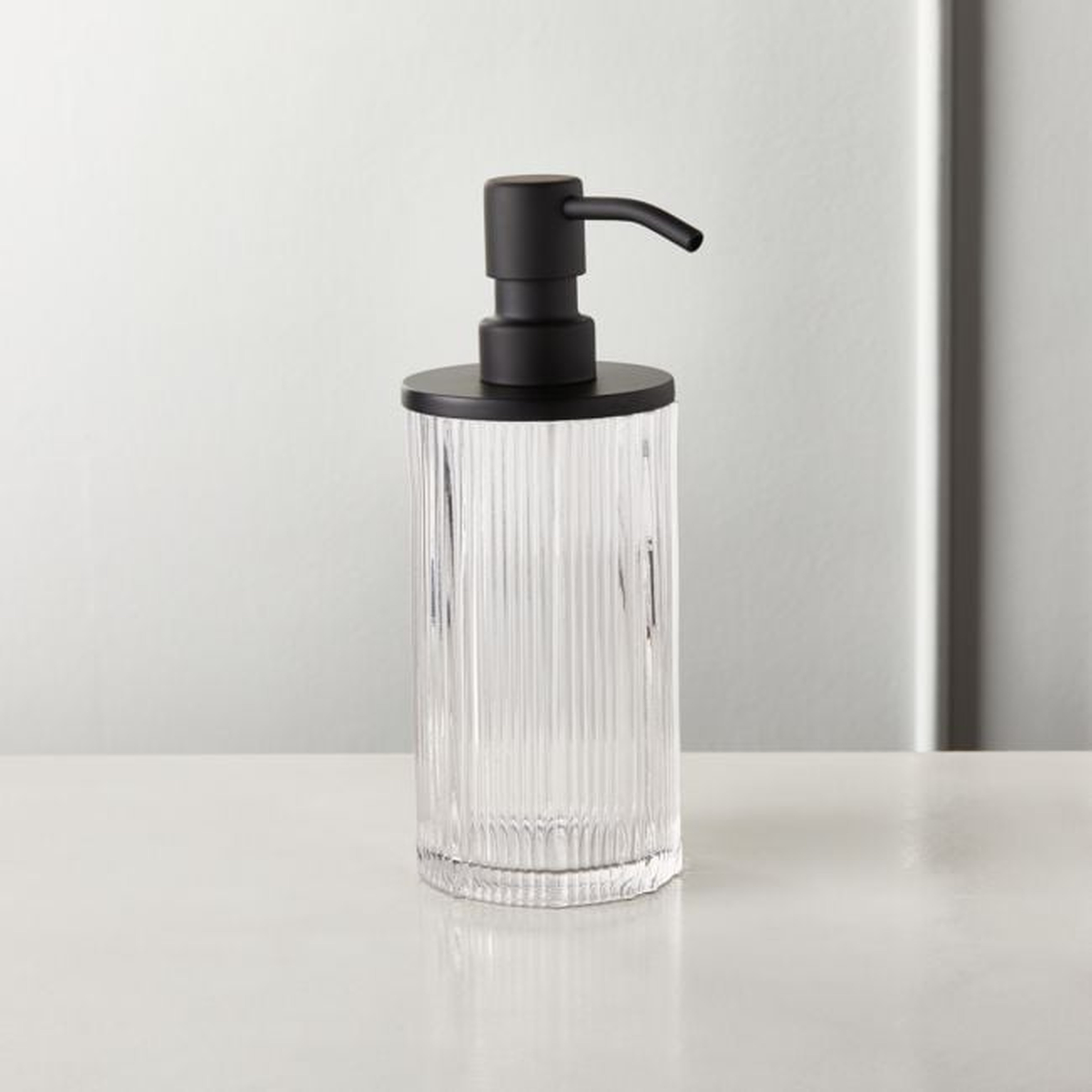 Athena Ribbed Glass Soap Pump, Restock in early July, 2023. - CB2