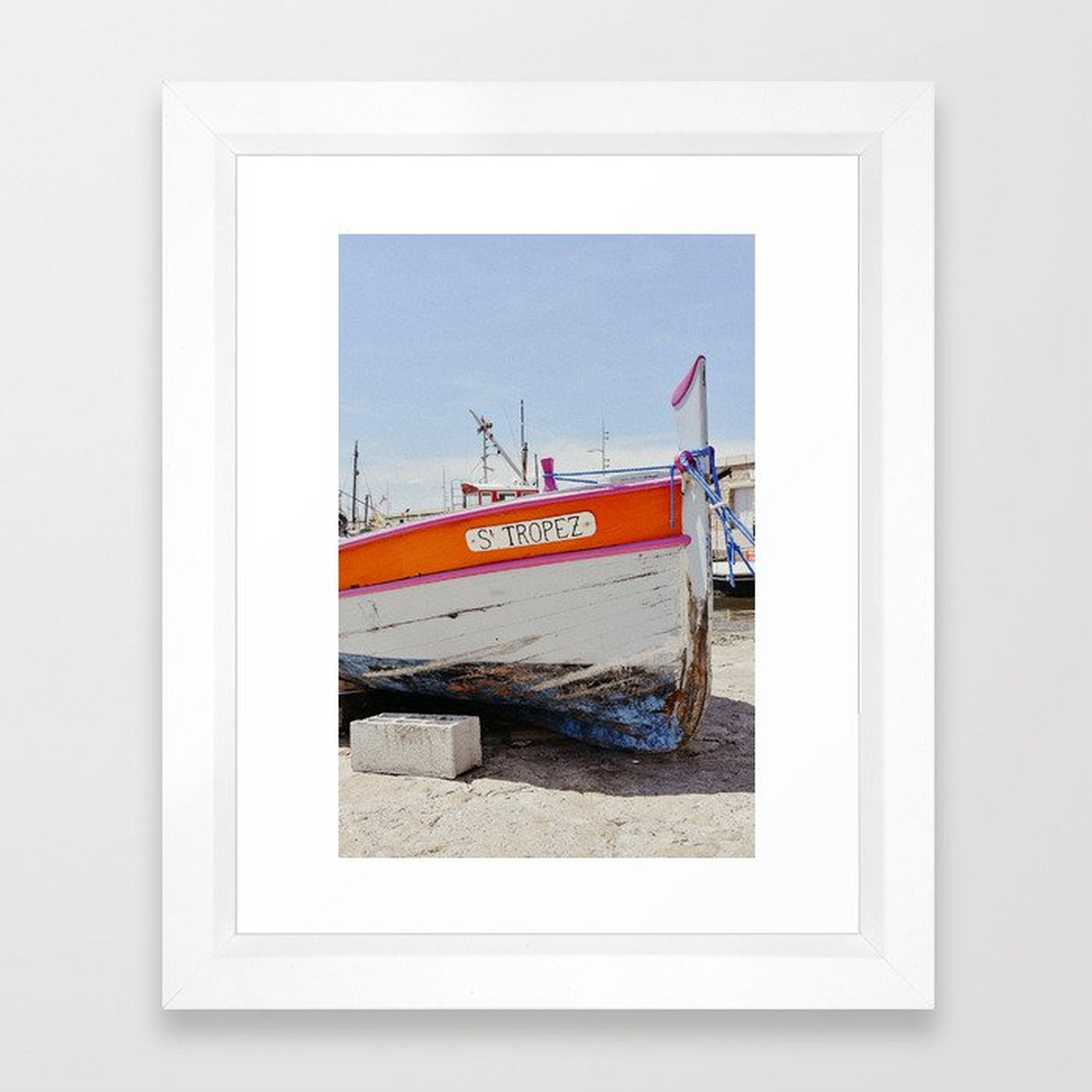A boat in the harbor of St Tropez, France | South of France Riviera | Yellow colored art print Framed Art Print - Society6
