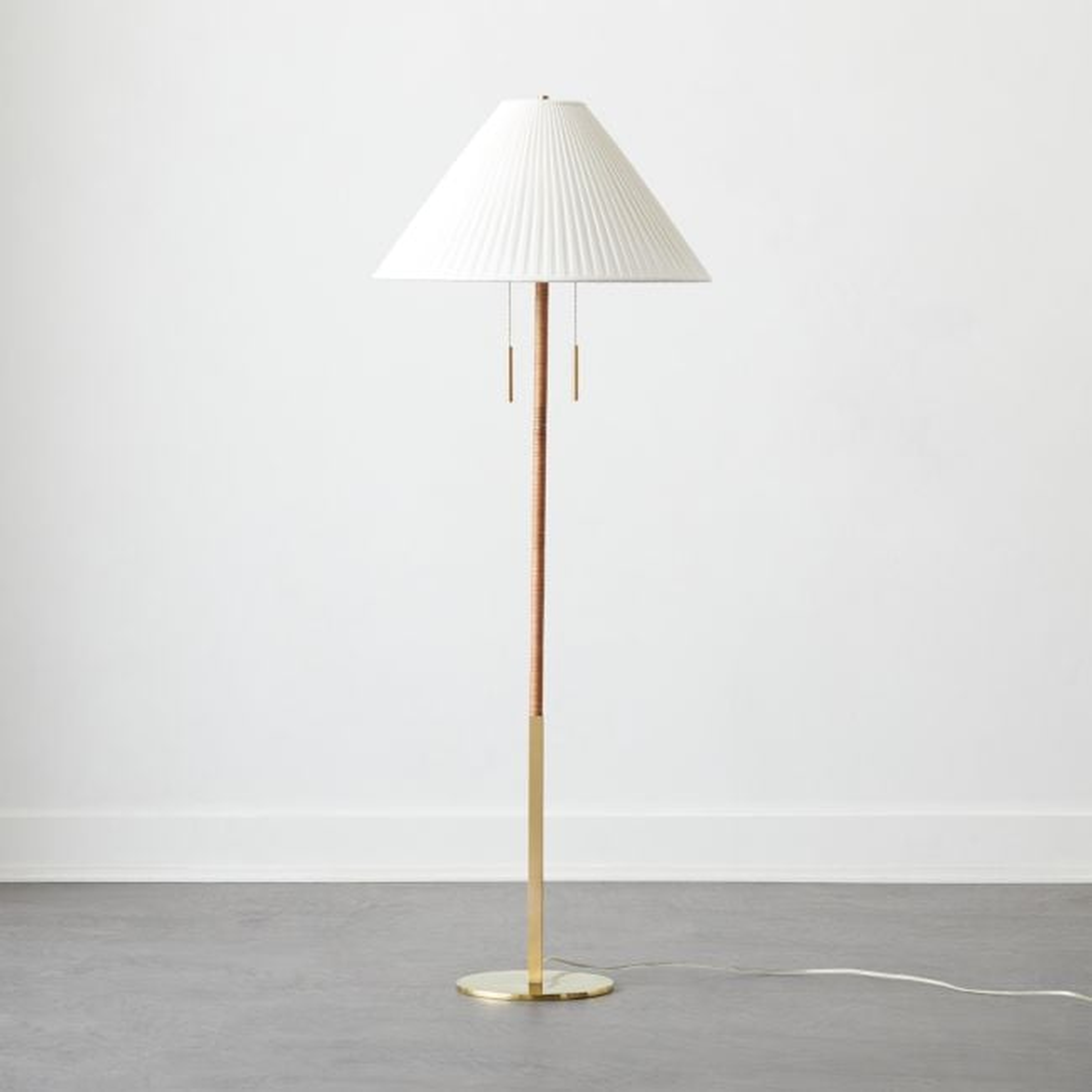 Pogo Brass and Cane Floor Lamp - CB2