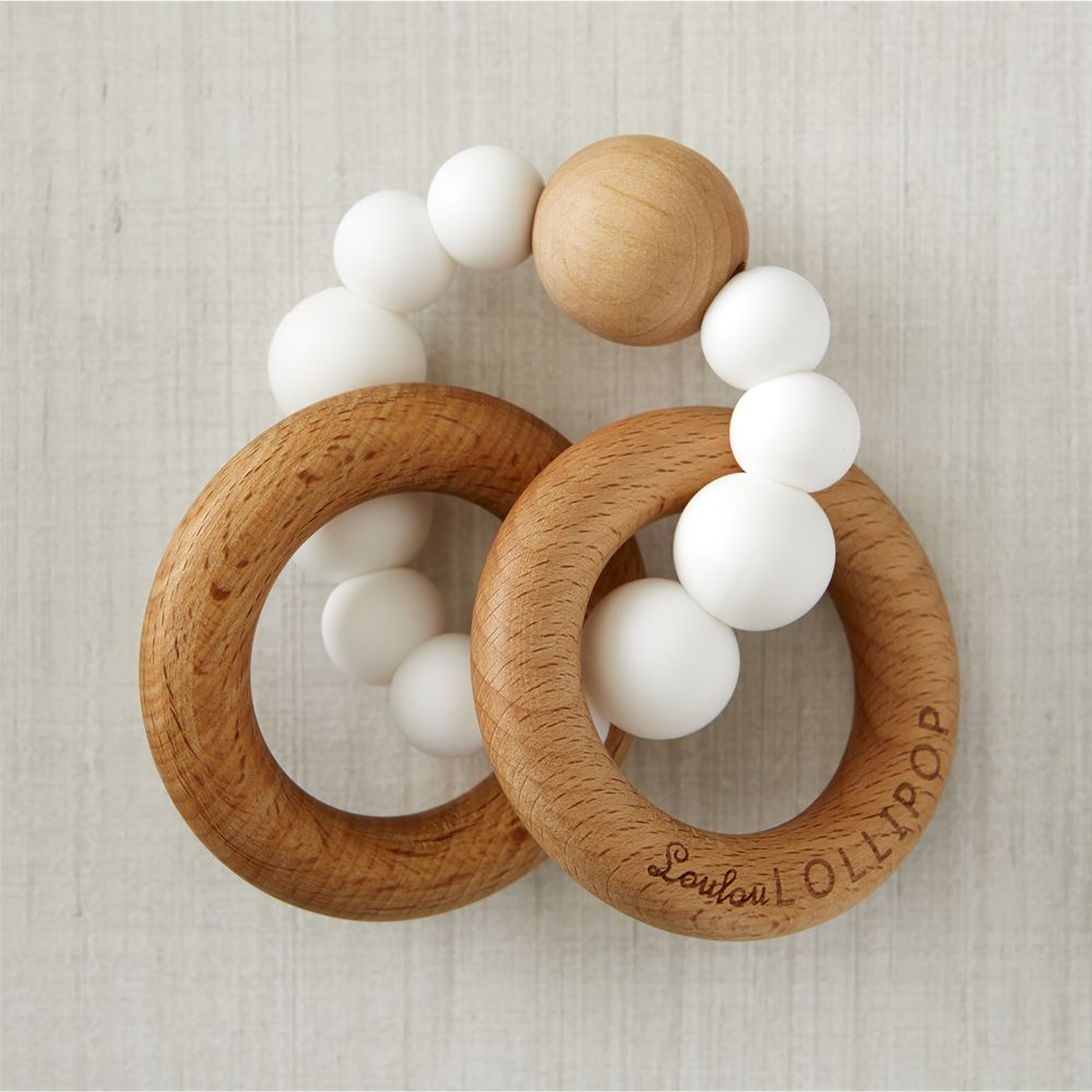 Loulou Lollipop Wood and White Silicone Baby Teether - Crate and Barrel