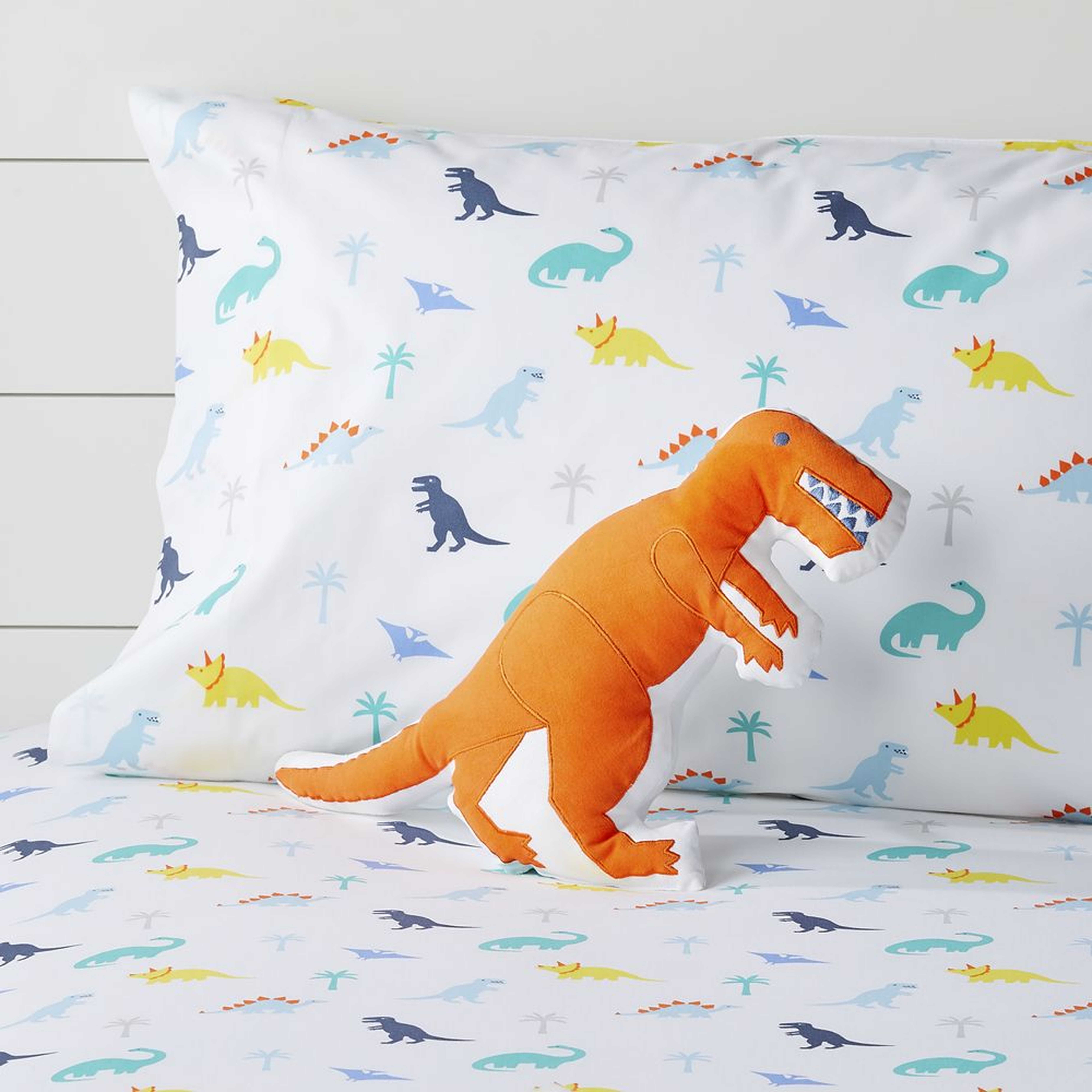 Prehistoric Pals Orange Dinosaur Throw Pillow - Crate and Barrel
