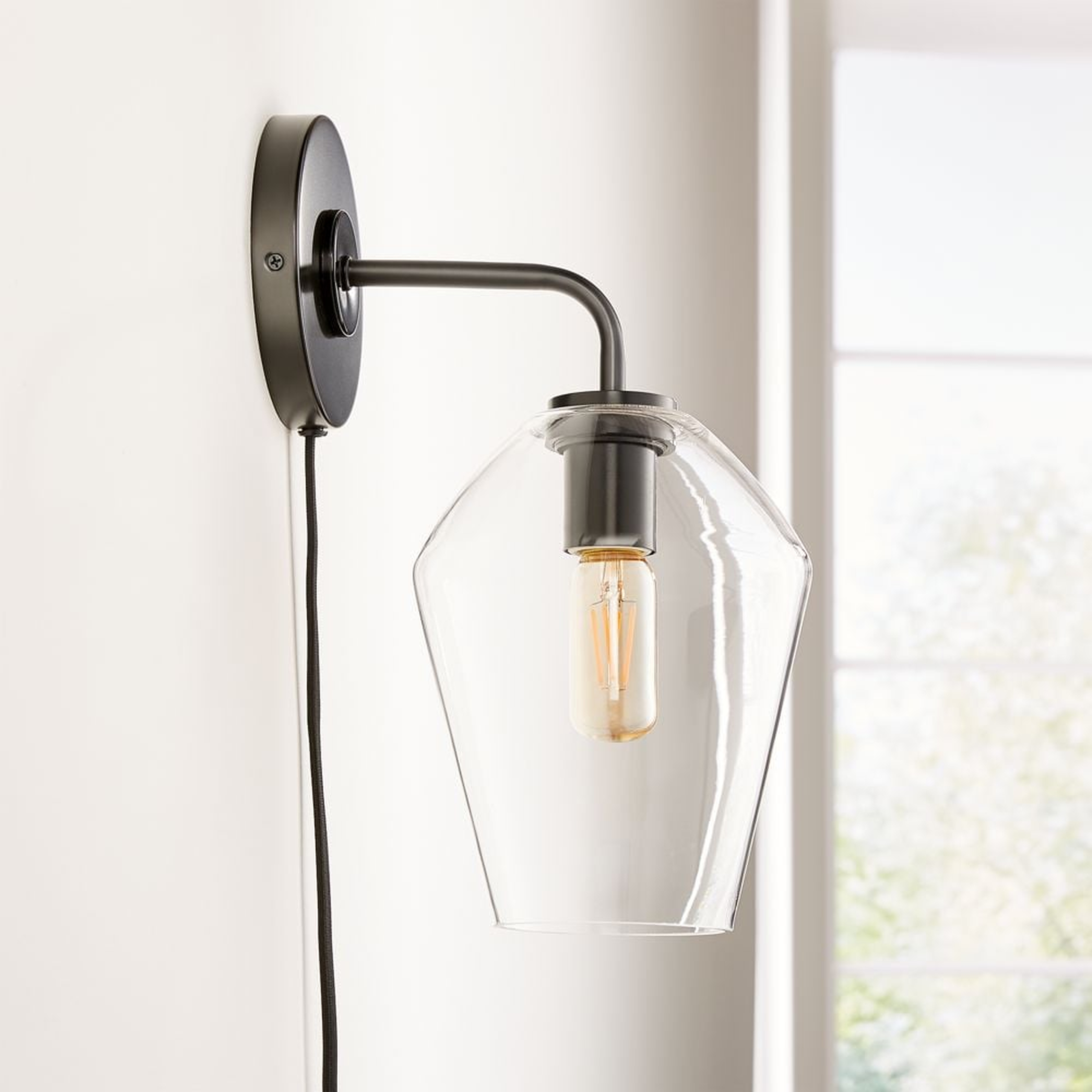 Arren Black Plug In Wall Sconce Light with Clear Angled Shade - Crate and Barrel