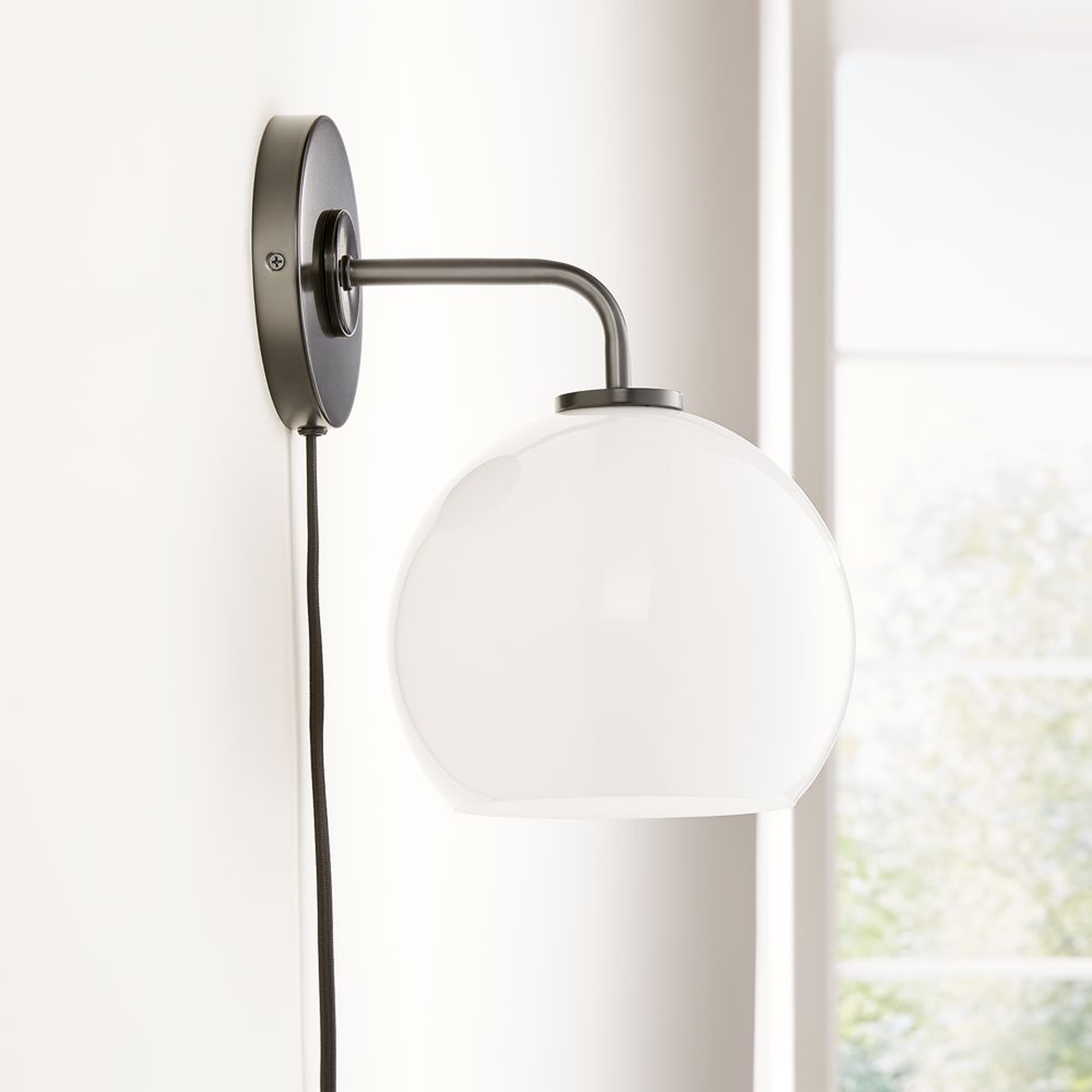 Arren Black Plug In Wall Sconce Light with Milk Round Shade - Crate and Barrel