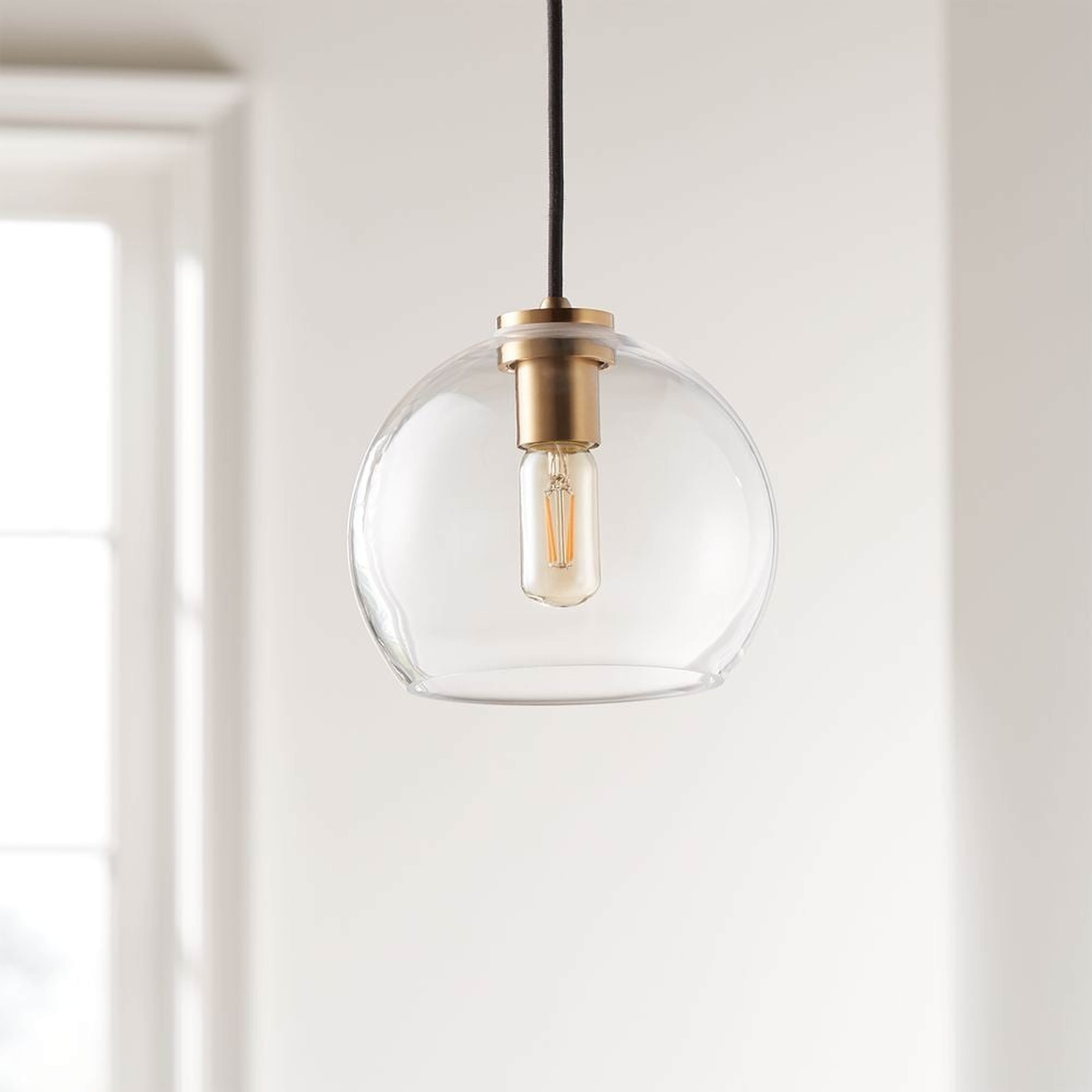 Arren Brass Single Pendant Light with Clear Round Shade - Crate and Barrel