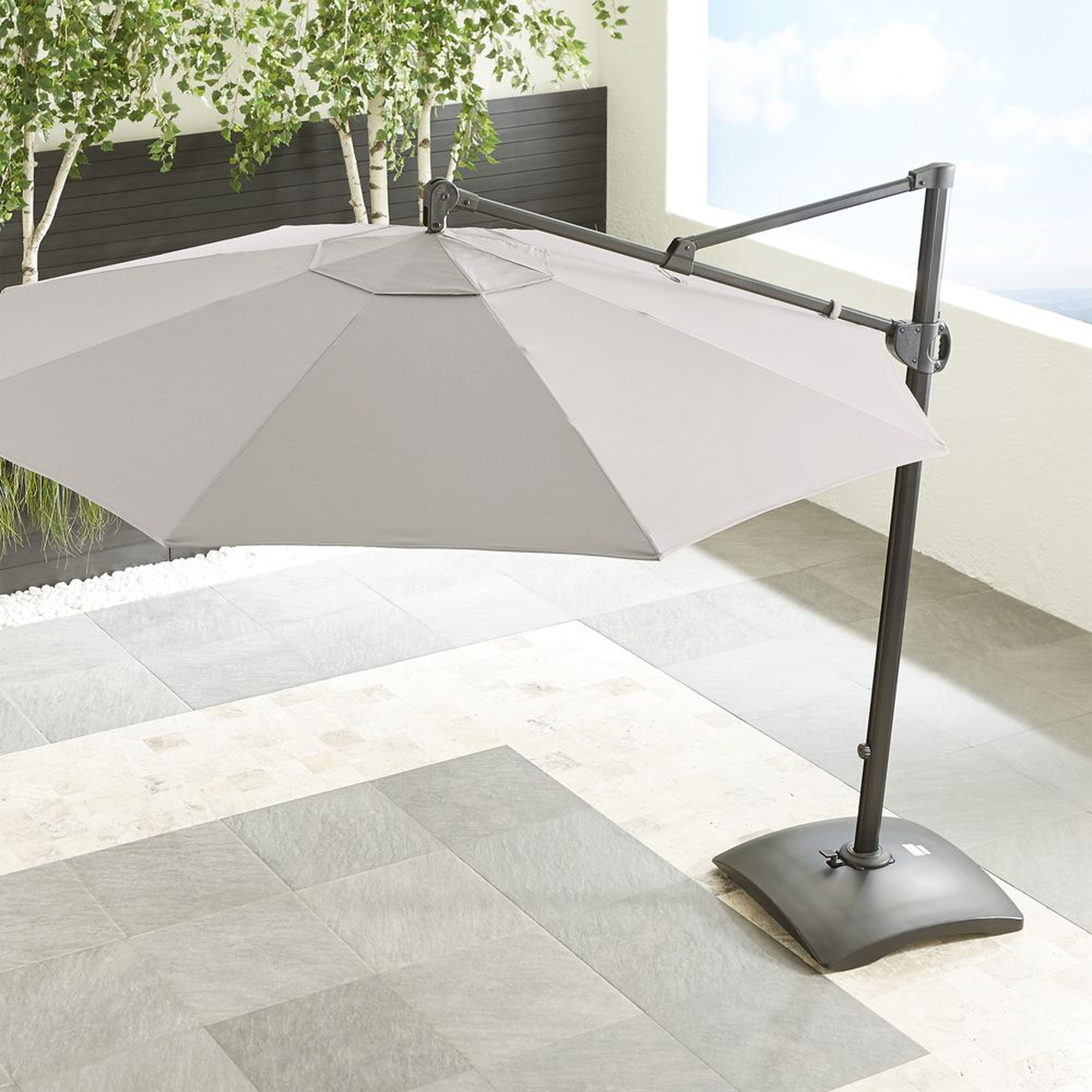 10' Sunbrella ® Silver Round Cantilever Outdoor Patio Umbrella with Base - Crate and Barrel