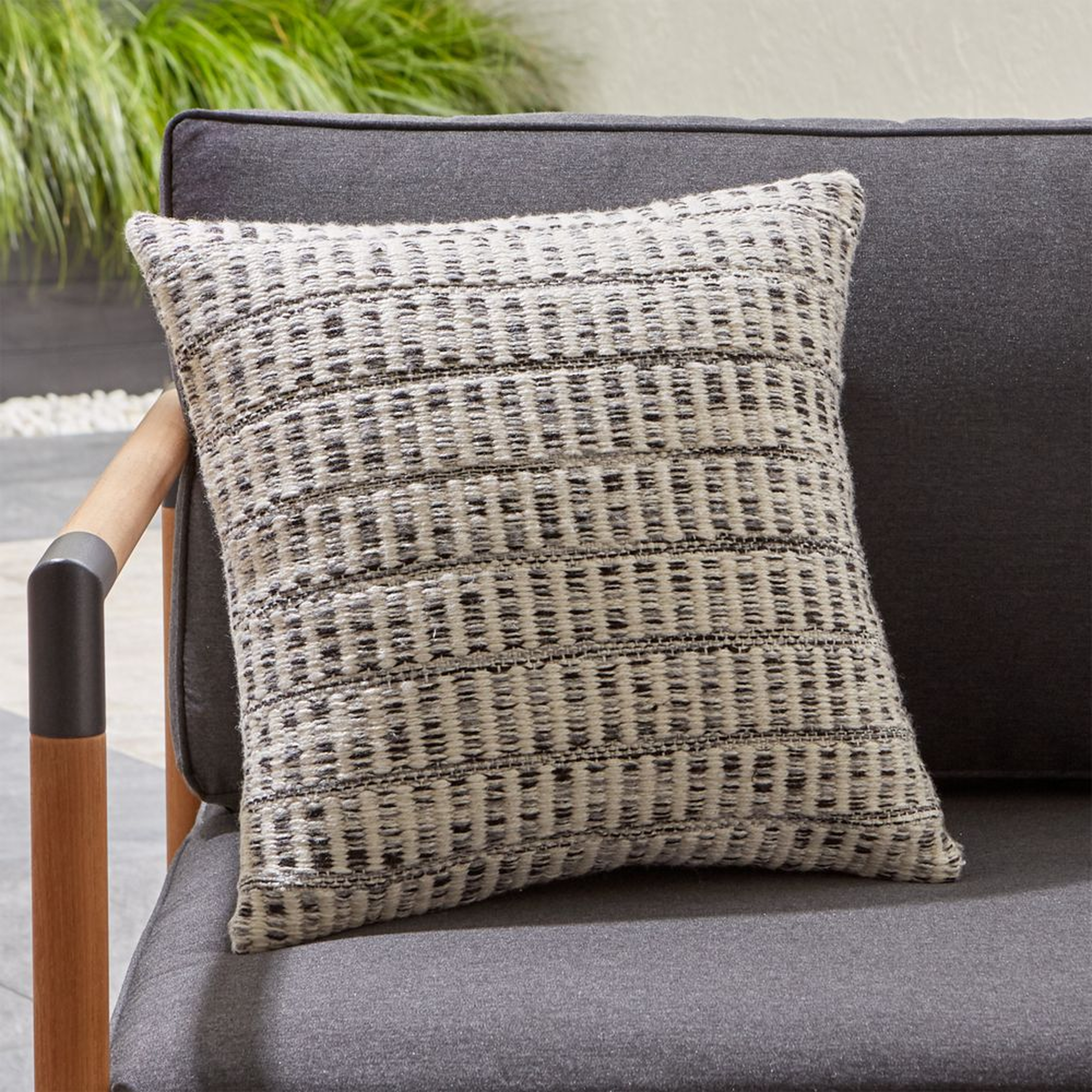 Mohave Heathered Outdoor Pillow. - Crate and Barrel