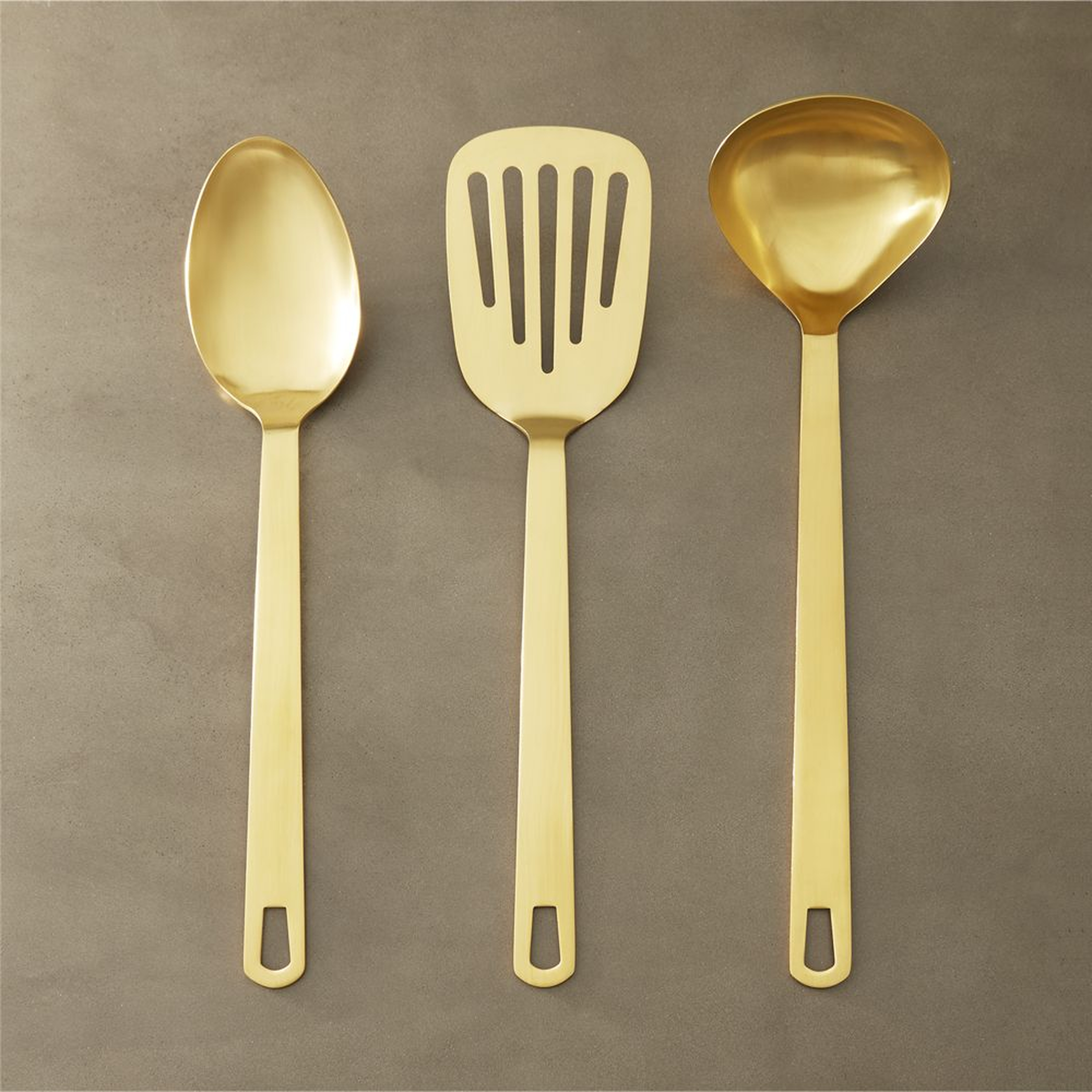 set of 3 brushed gold kitchen utensils - CB2