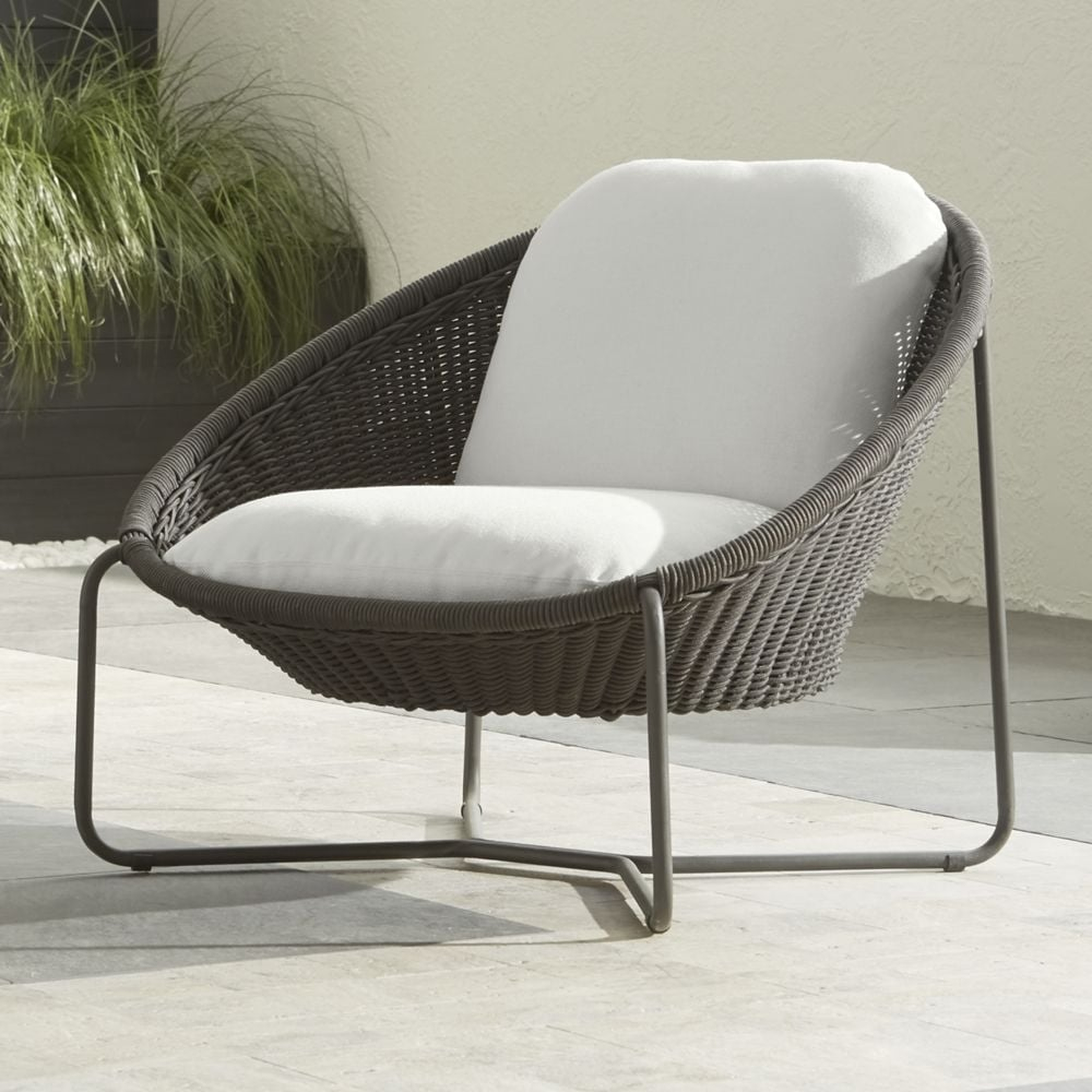 Morocco Graphite Oval Outdoor Lounge Chair with White Cushion - Crate and Barrel