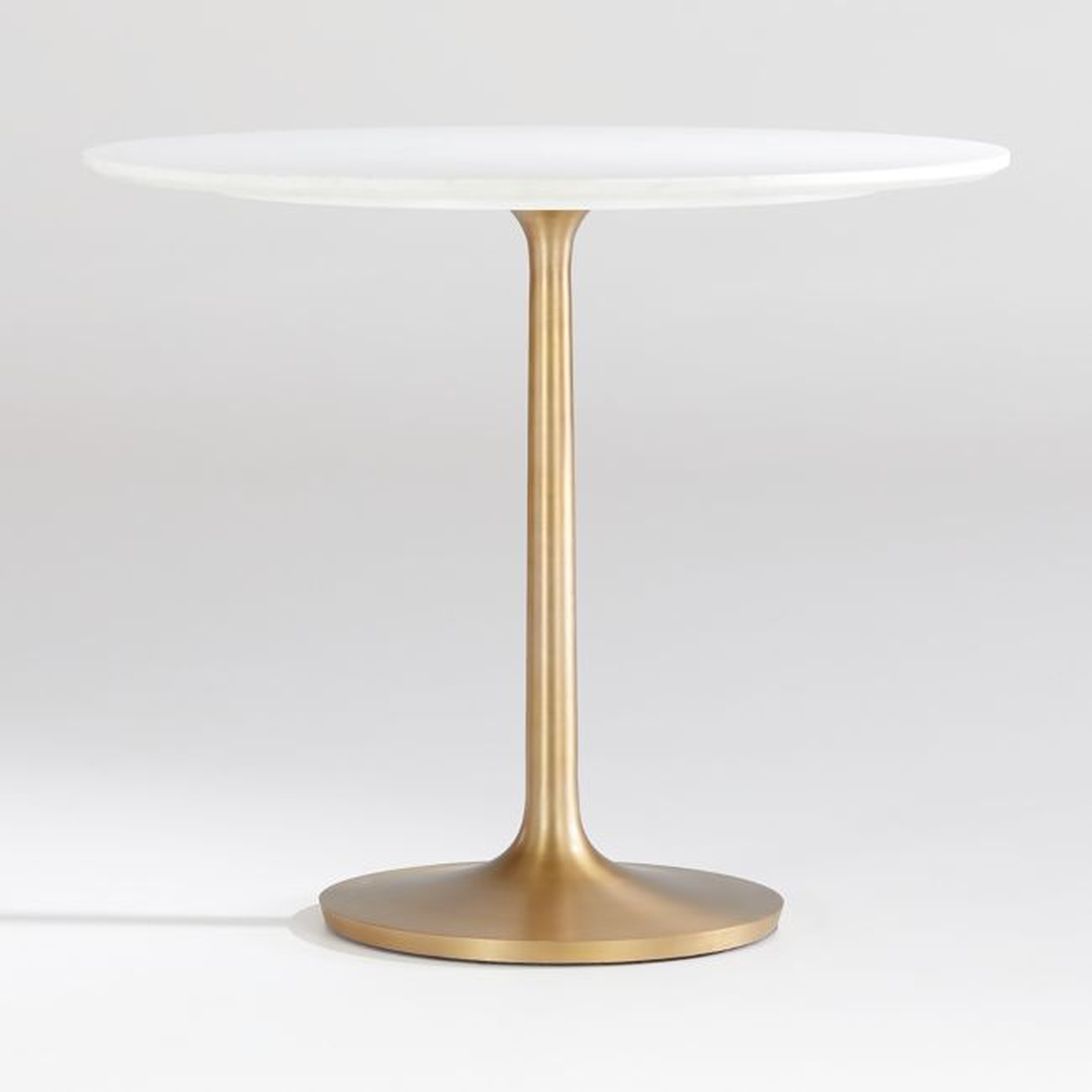 Nero 36" Round White Marble Dining Table with Brass Base - Crate and Barrel