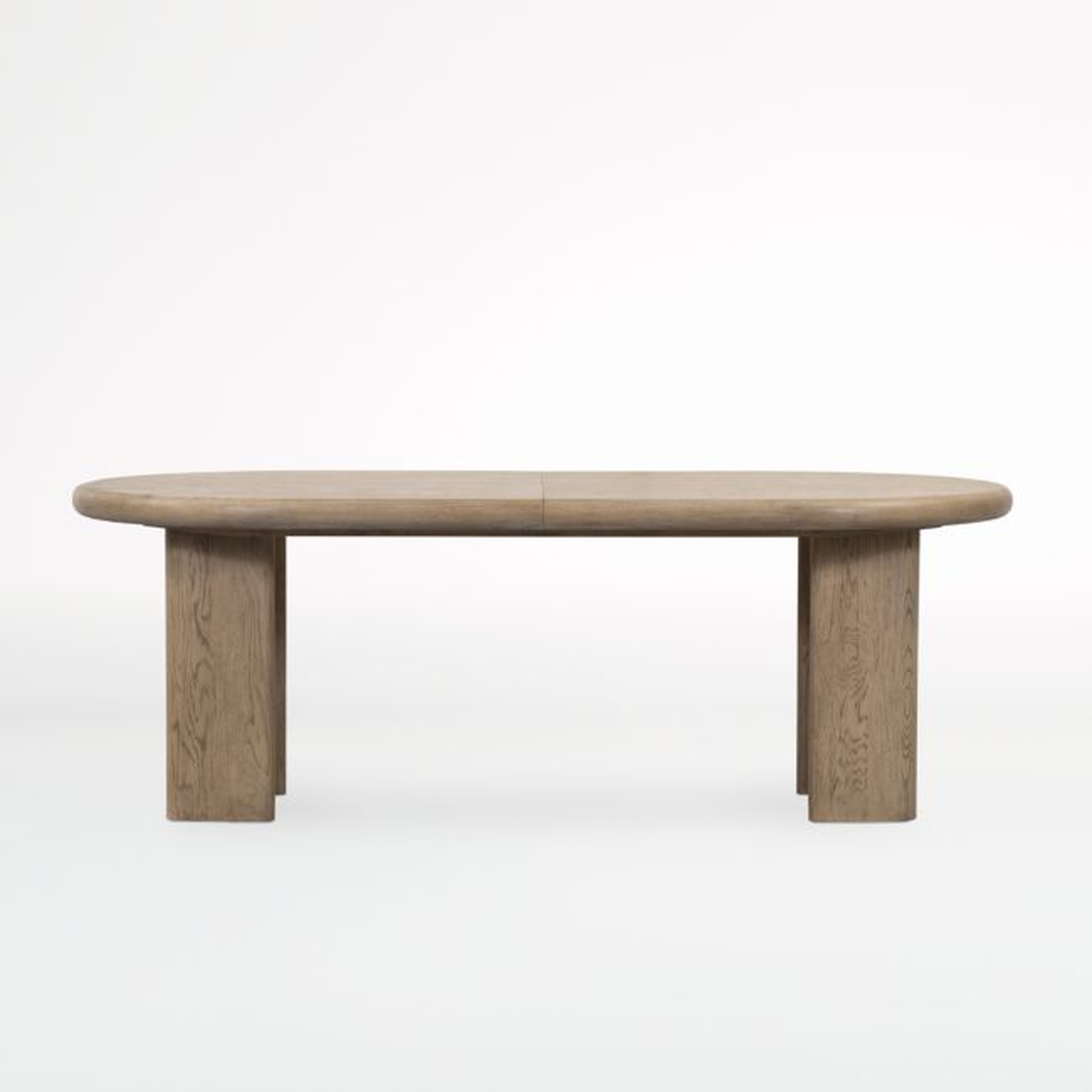 Carrington 87"-107" Wood Oval Extendable Dining Table - Crate and Barrel