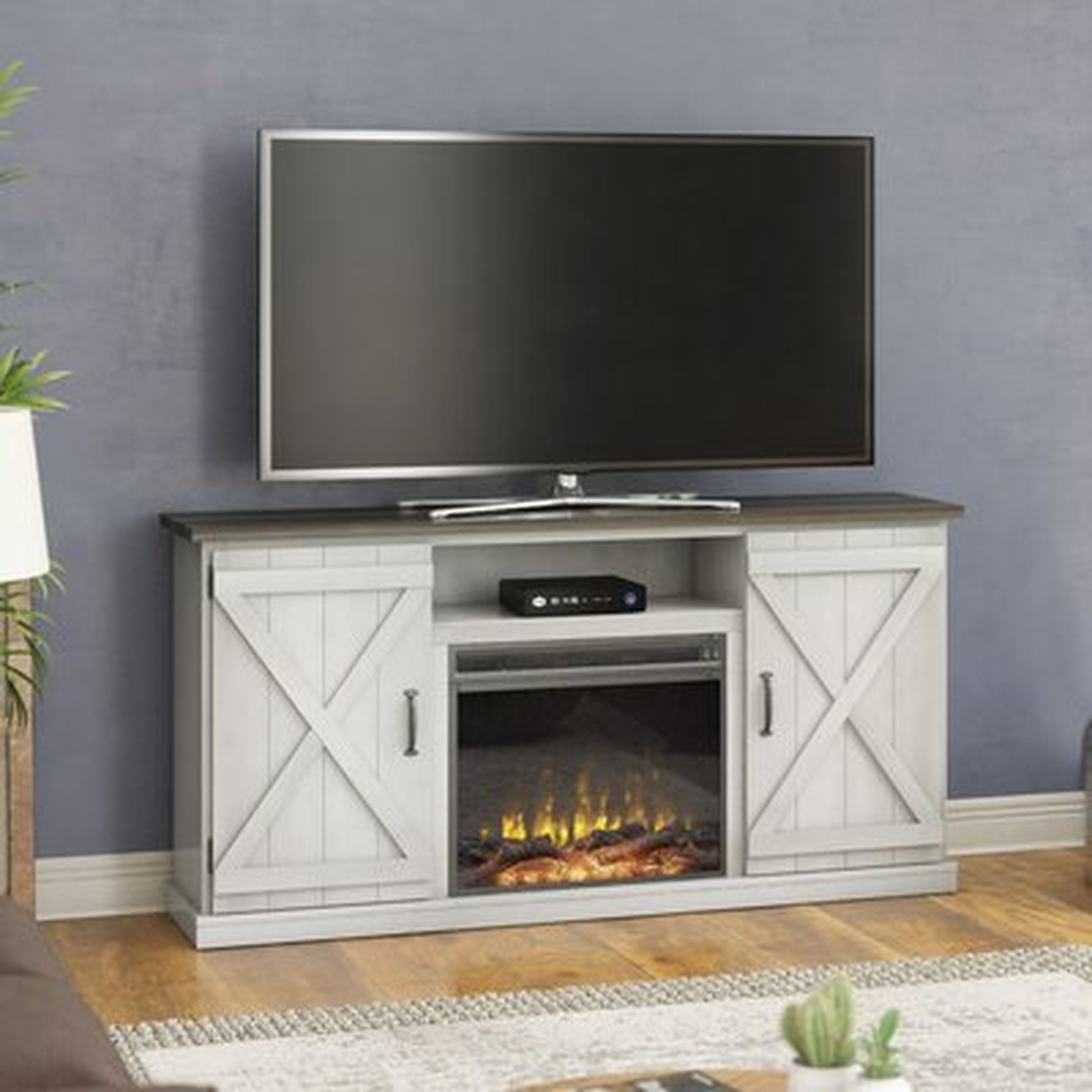 Briella TV Stand for TVs up to 70" with Fireplace Included - Wayfair