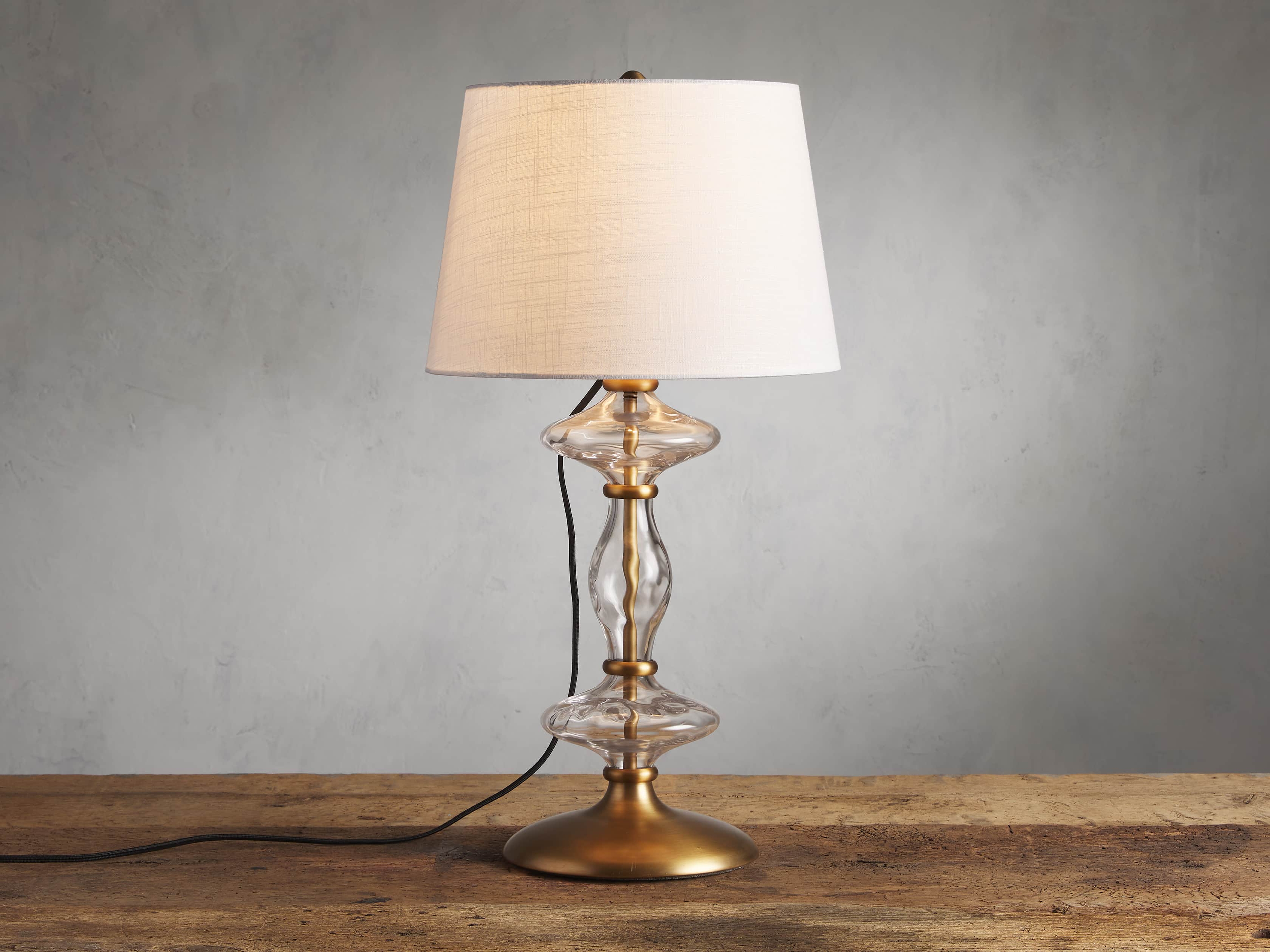 Deluca Table Lamp in Gold - Arhaus