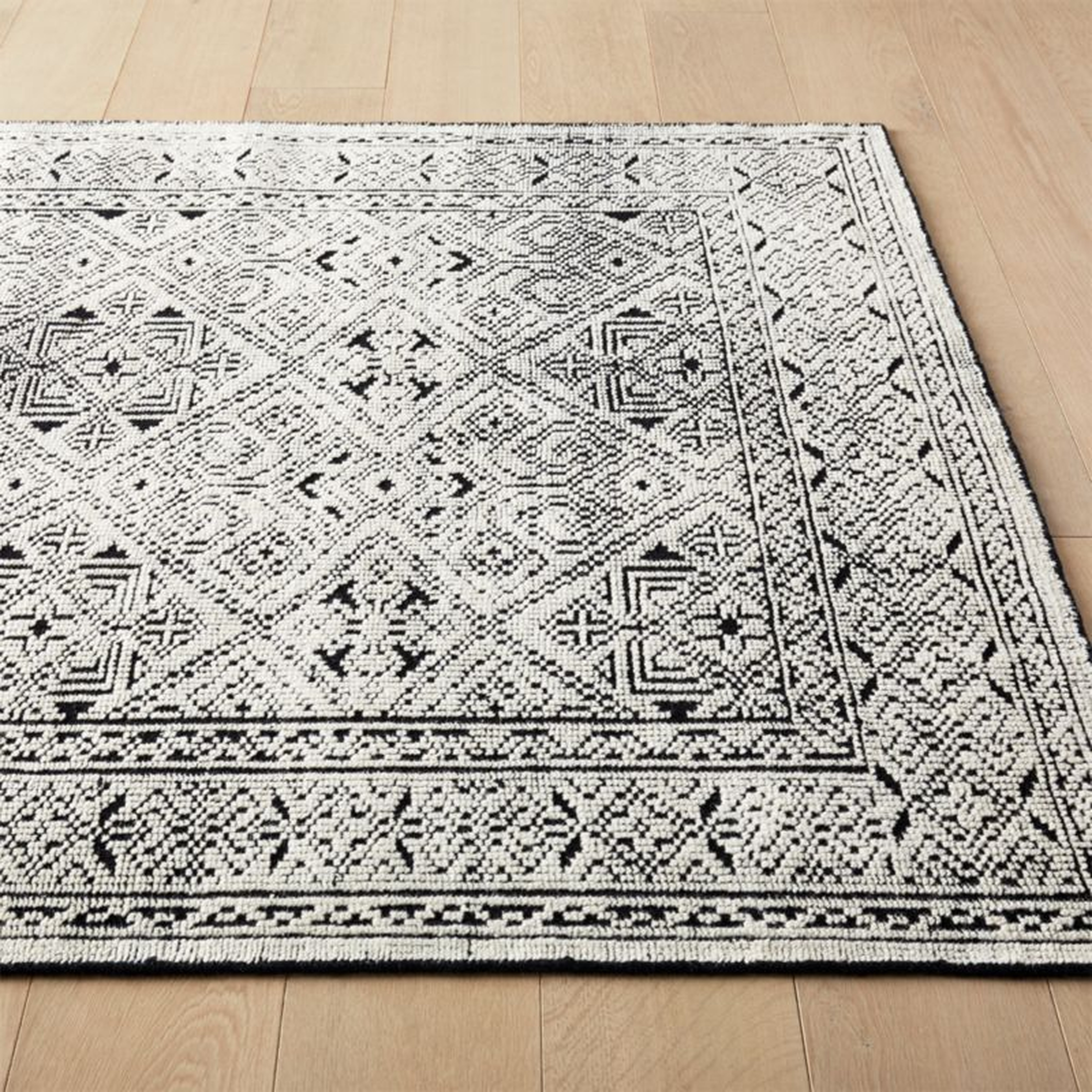 Raumont Hand-Knotted Black Detailed Modern Area Rug 10'x 14' - CB2