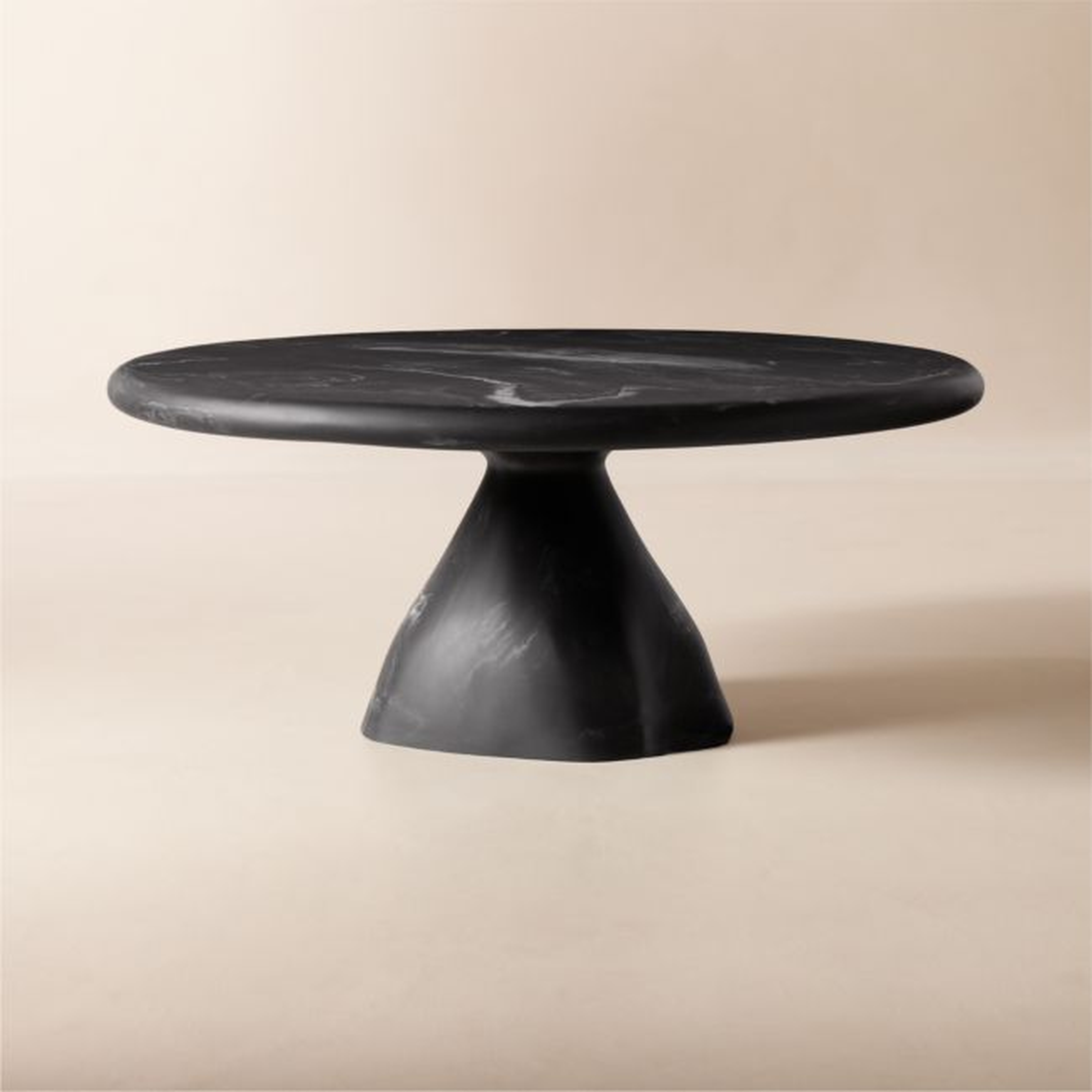 Espira 35" Round Black Marbled Resin Coffee Table - CB2