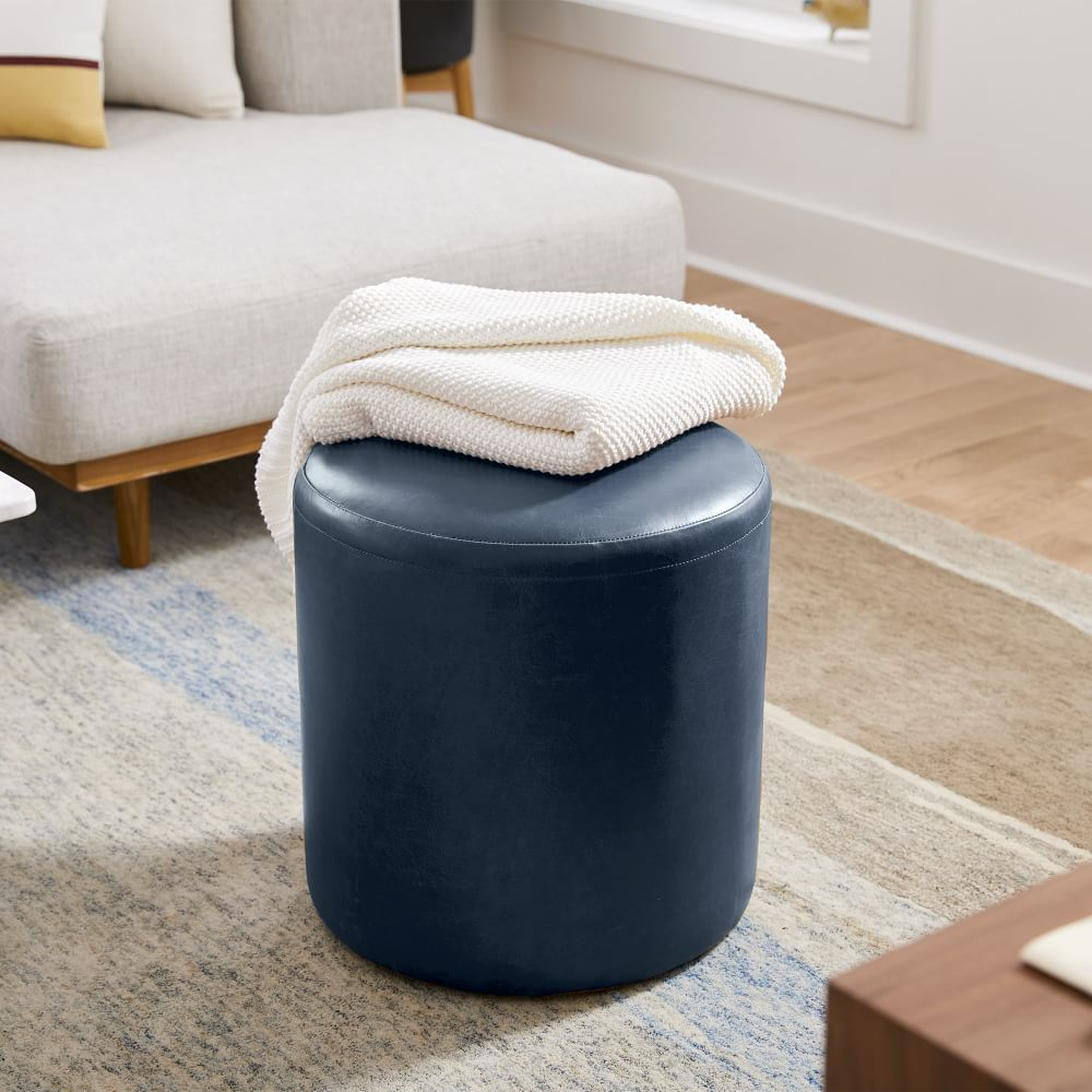 Isla Ottoman, Small, Sierra Leather, Navy, Concealed Support - West Elm