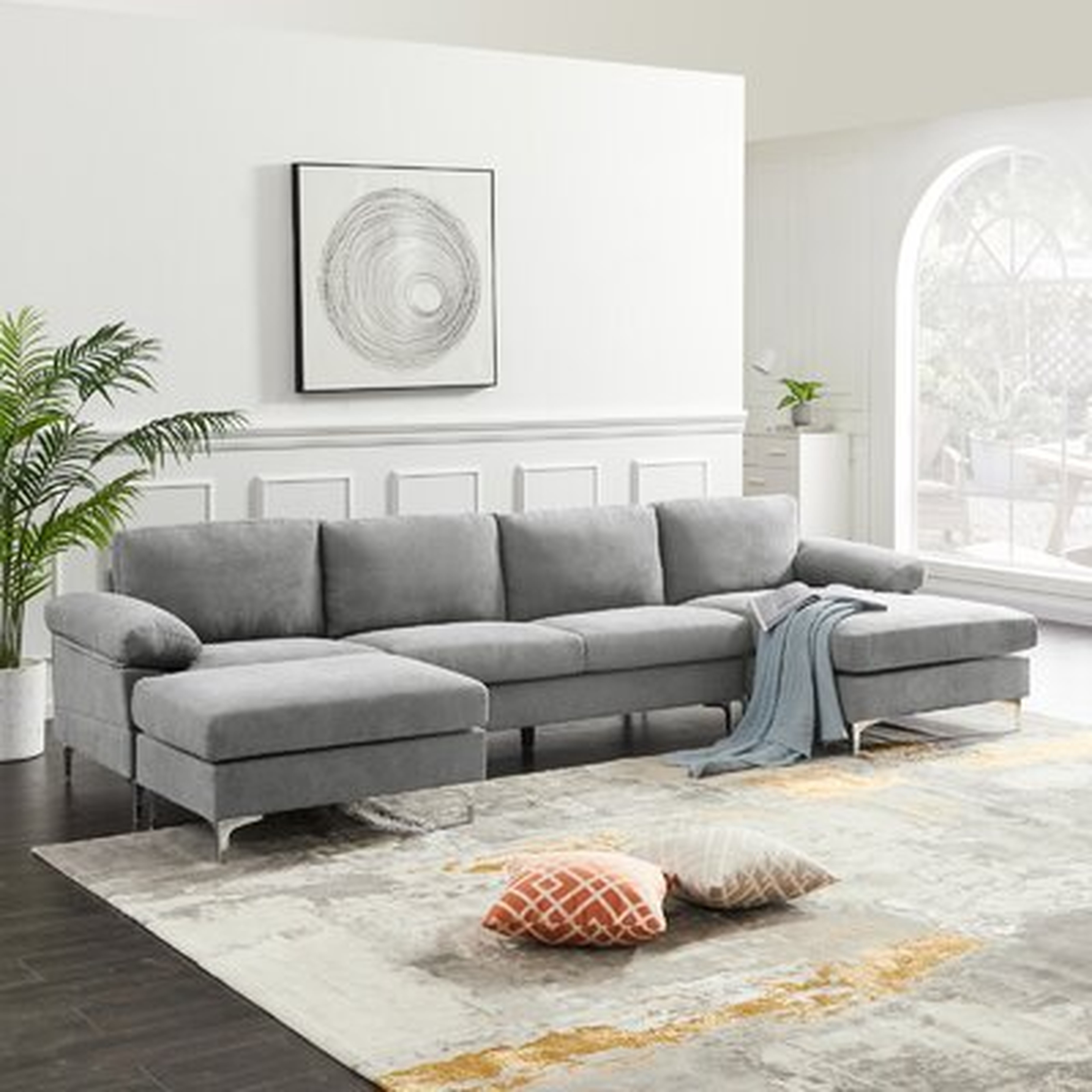Fitchner 131" Wide Reversible Corner Sectional with Ottoman - Wayfair