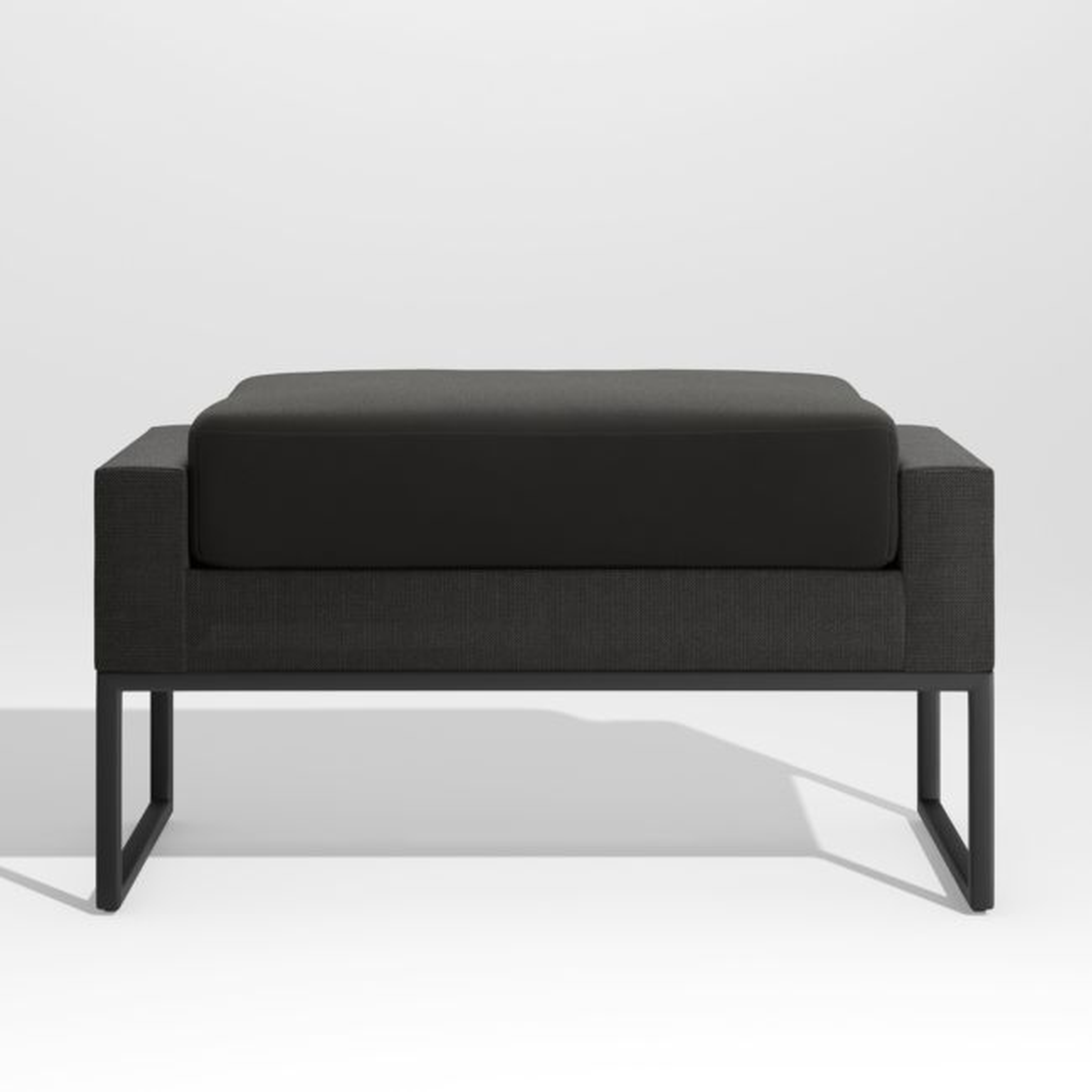 Dune Black Outdoor Ottoman with Black Cushion - Crate and Barrel
