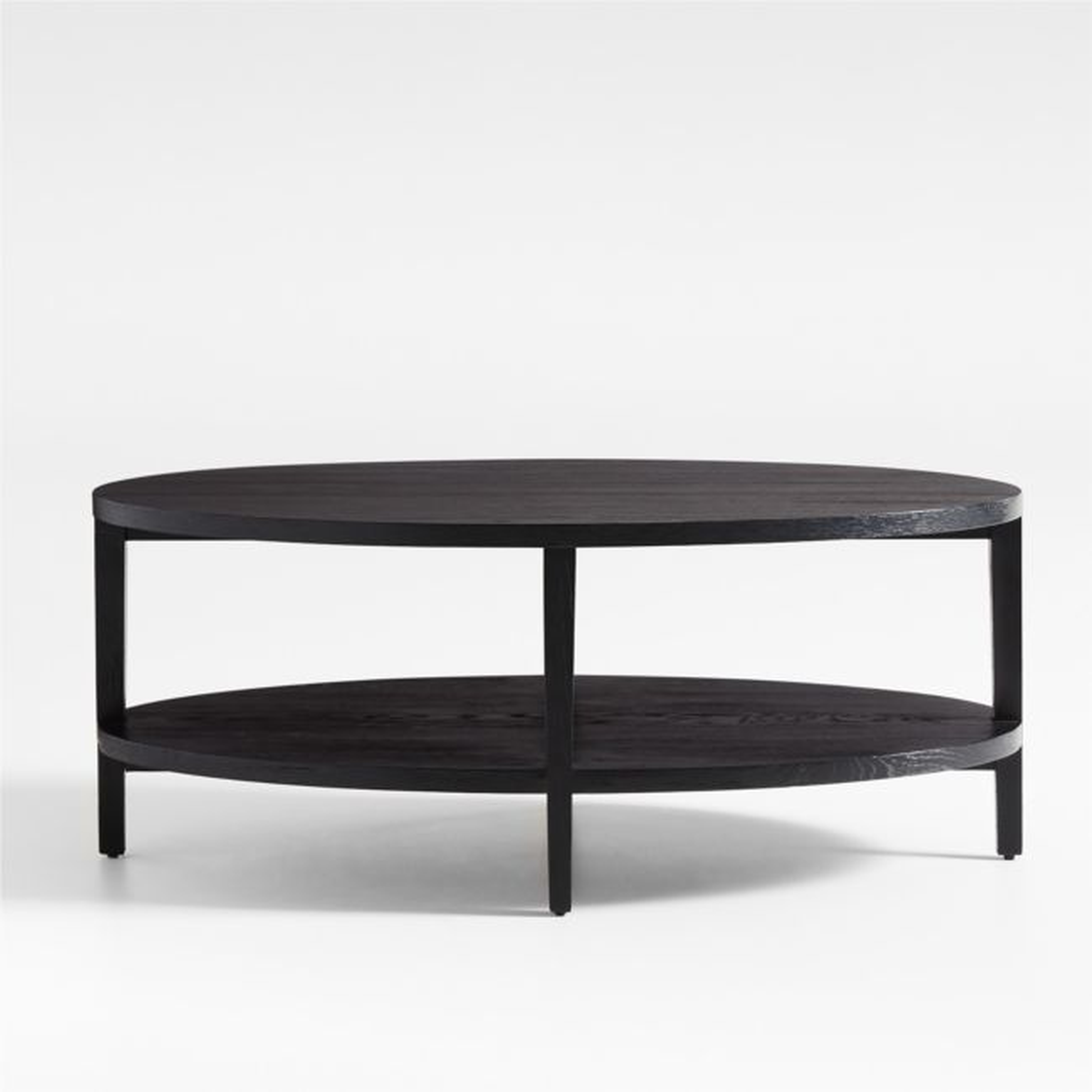 Clairemont Ebonized Oak Wood 48" Oval Coffee Table with Shelf - Crate and Barrel