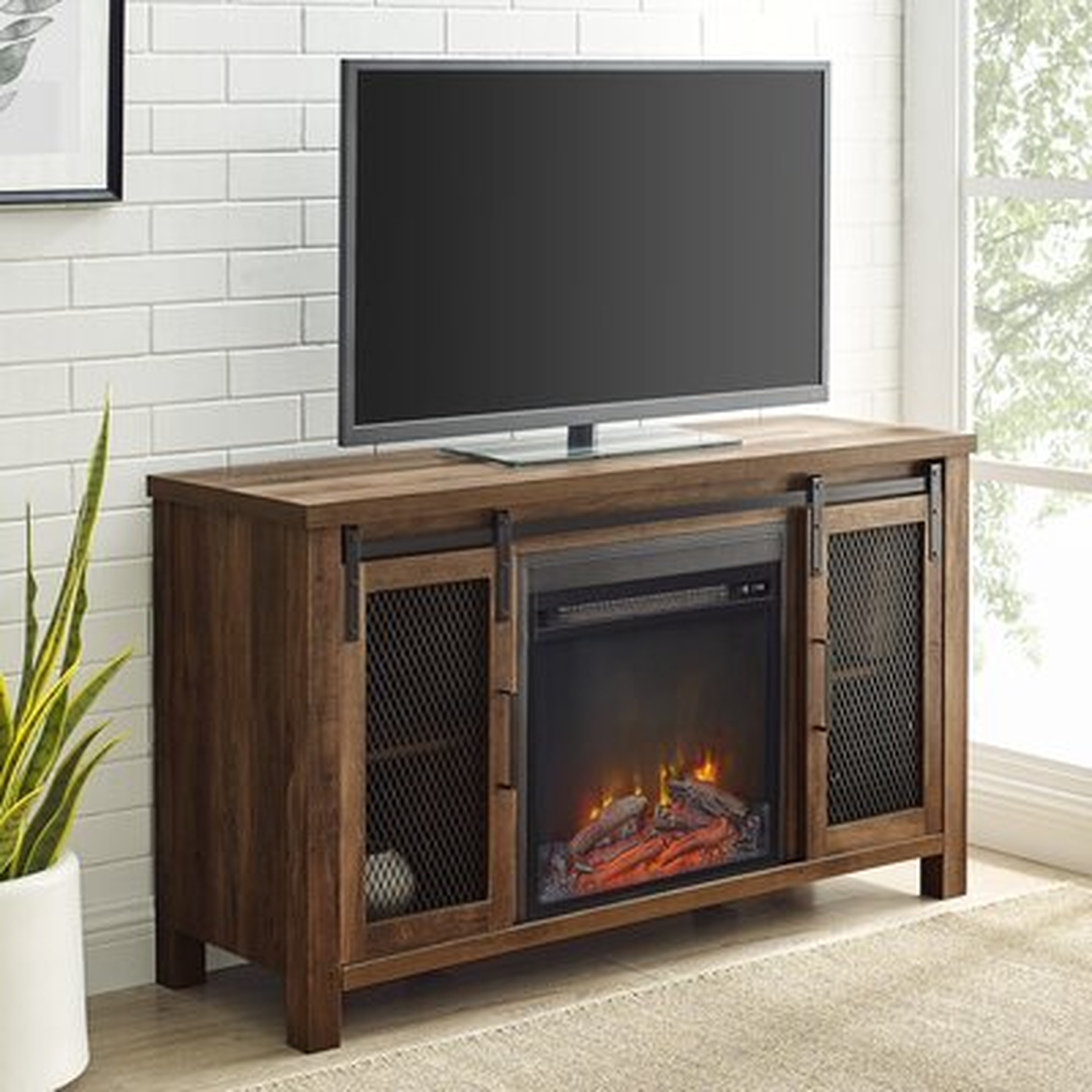 Mahan TV Stand for TVs up to 55" with Electric Fireplace Included - Wayfair