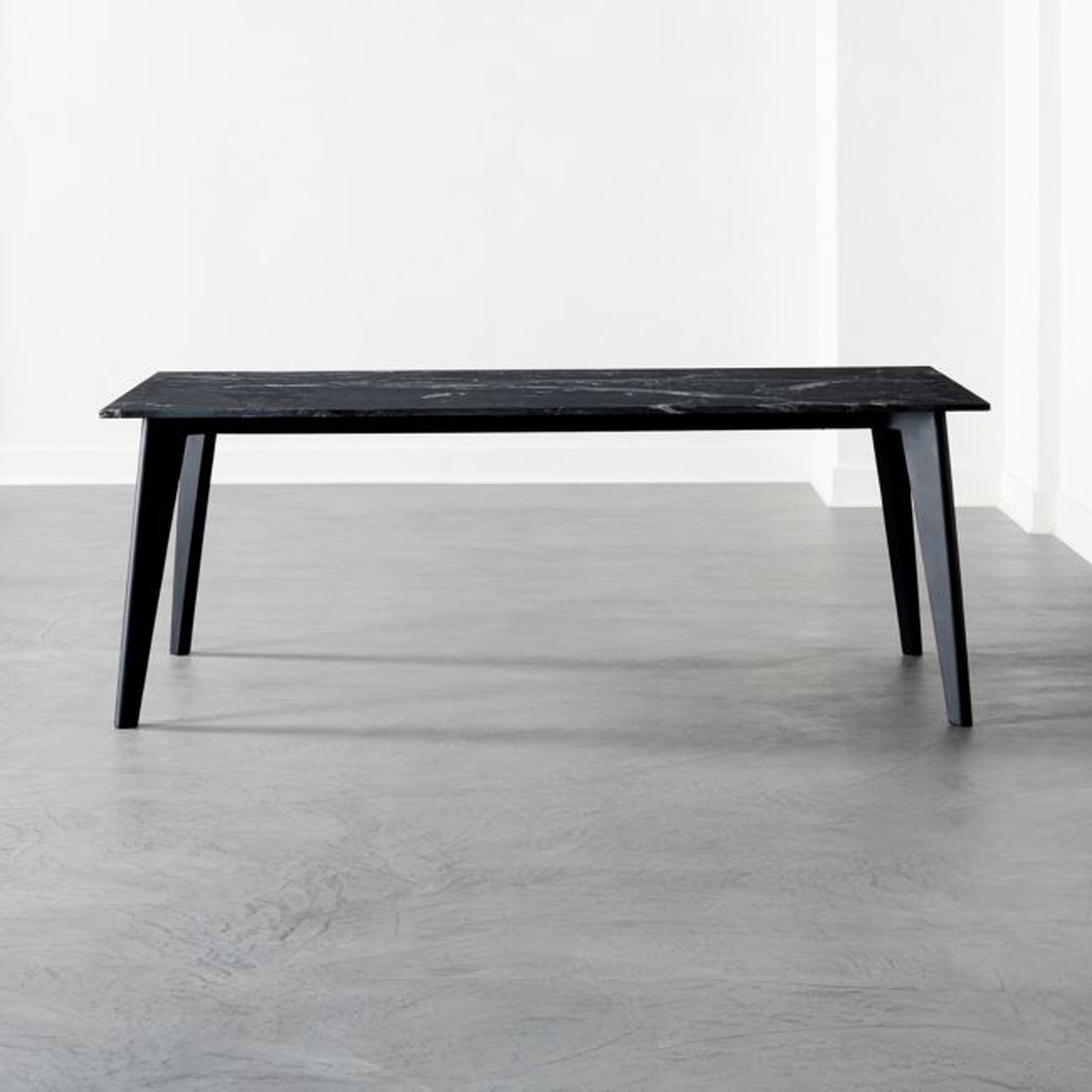 Harper Black Dining Table with Black Marble Top. - CB2