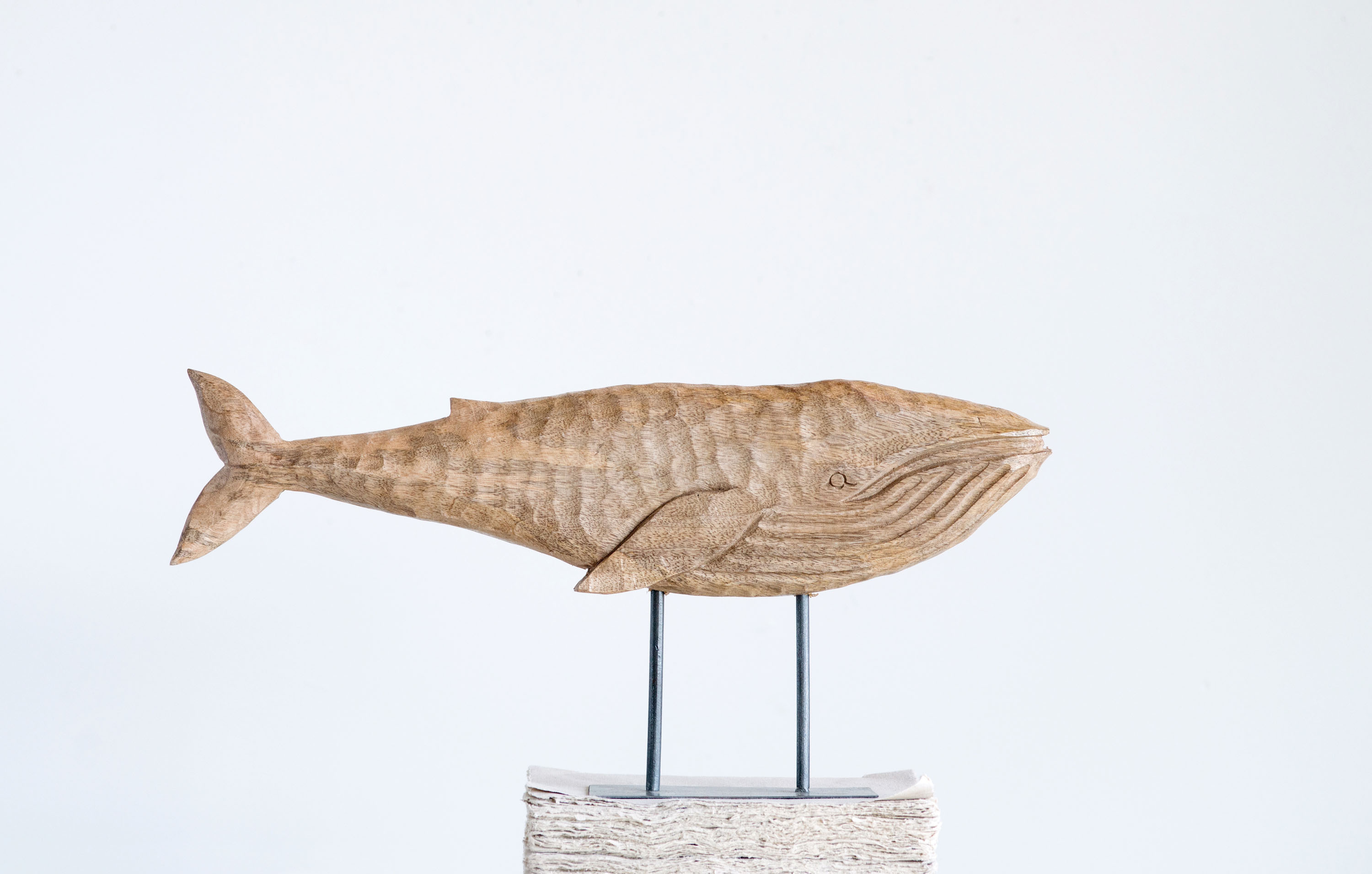 Hand-Carved Mango Wood Whale on Metal Stand - Nomad Home