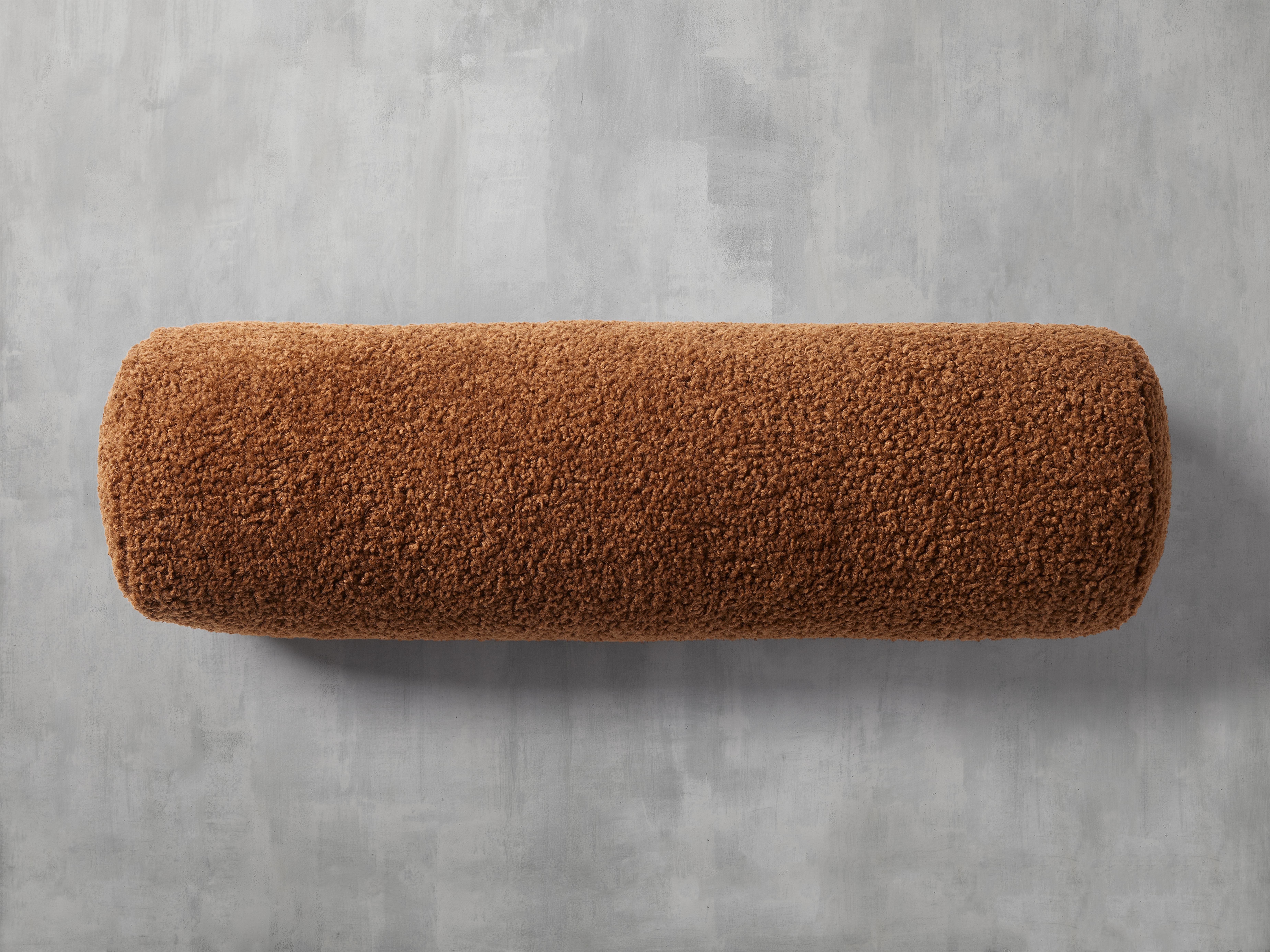 Faux Bolster Pillow Sherpa in Brown  Cognac - Arhaus