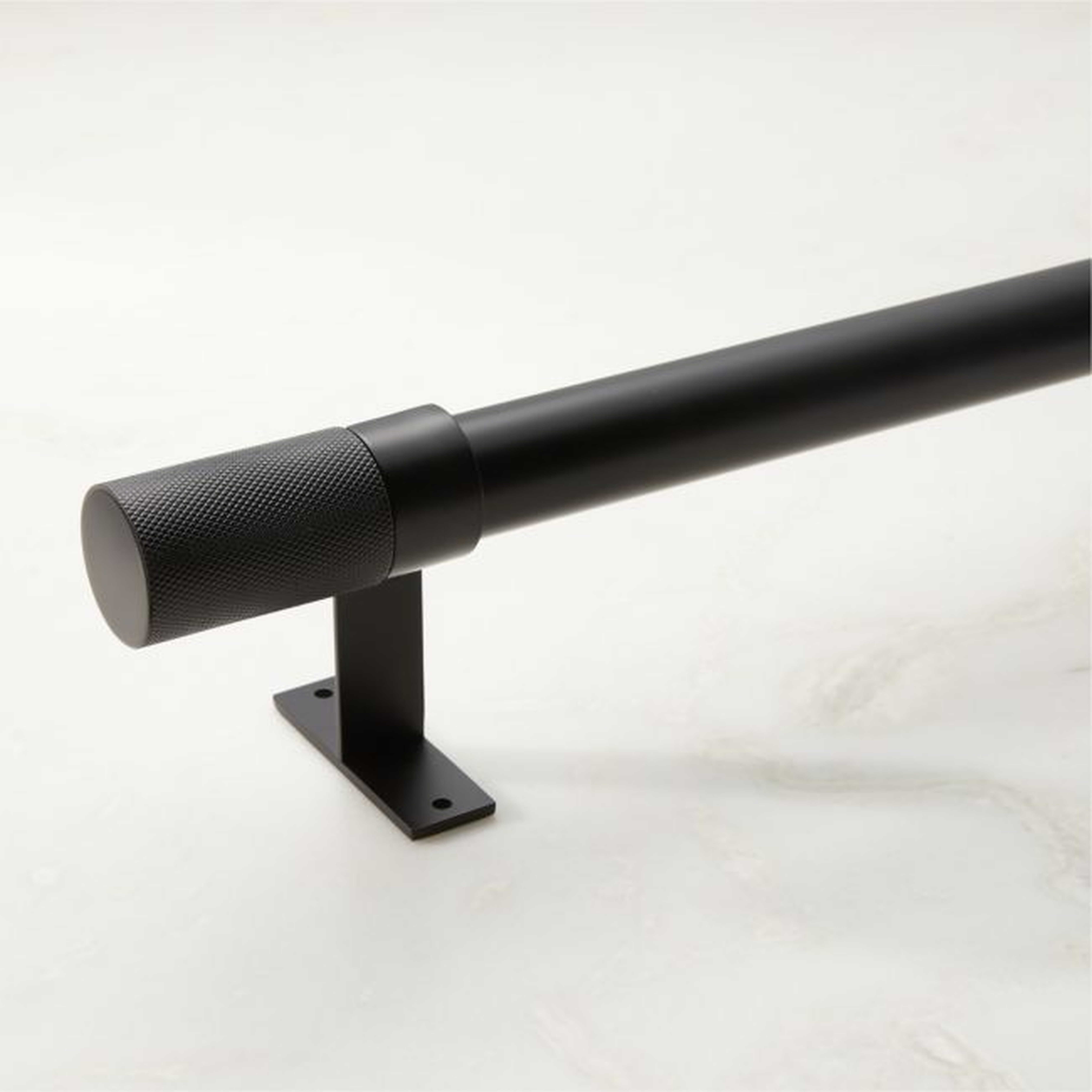 Porter Single Matte Black Curtain Rod with Knurled Finial 28''-48''x1.25'' - CB2