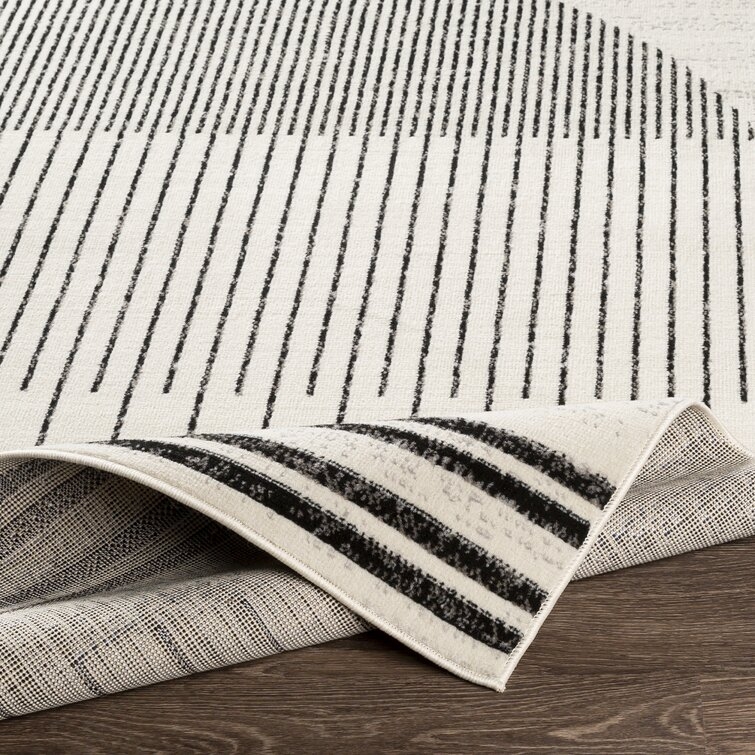 Corum Abstract Black/Ivory Area Rug - Image 1