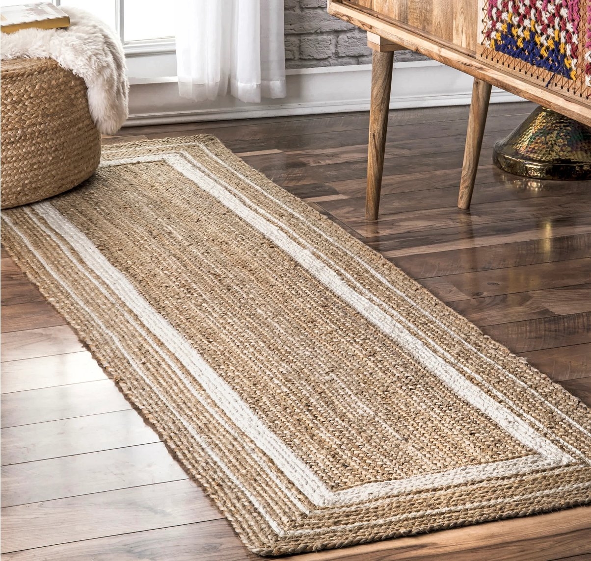 Braided Rikki Border Jute Area Rug - Image 0
