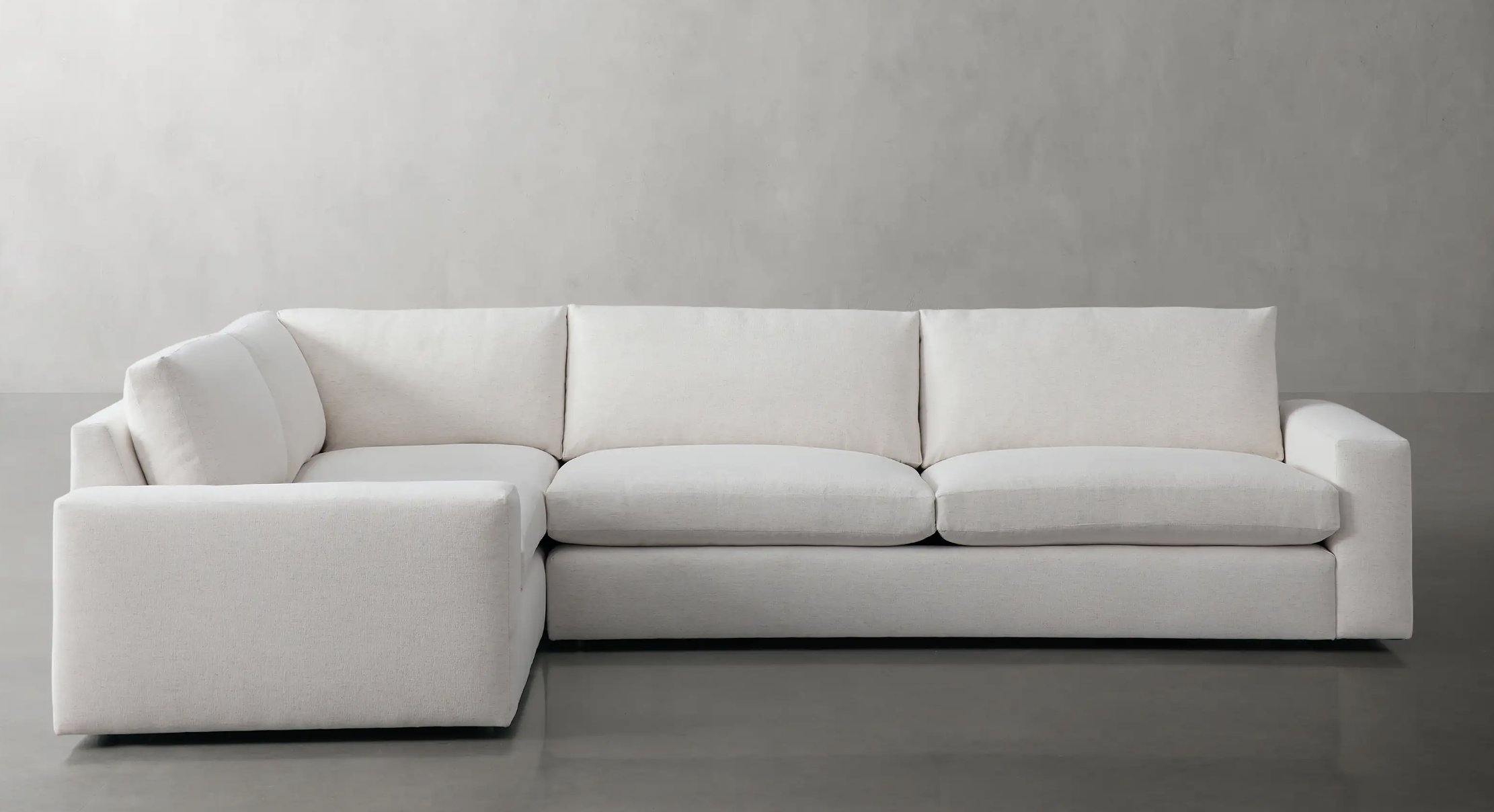 Kipton Wide Arm Two-Piece Sectional in Upholstered Natural - Image 0