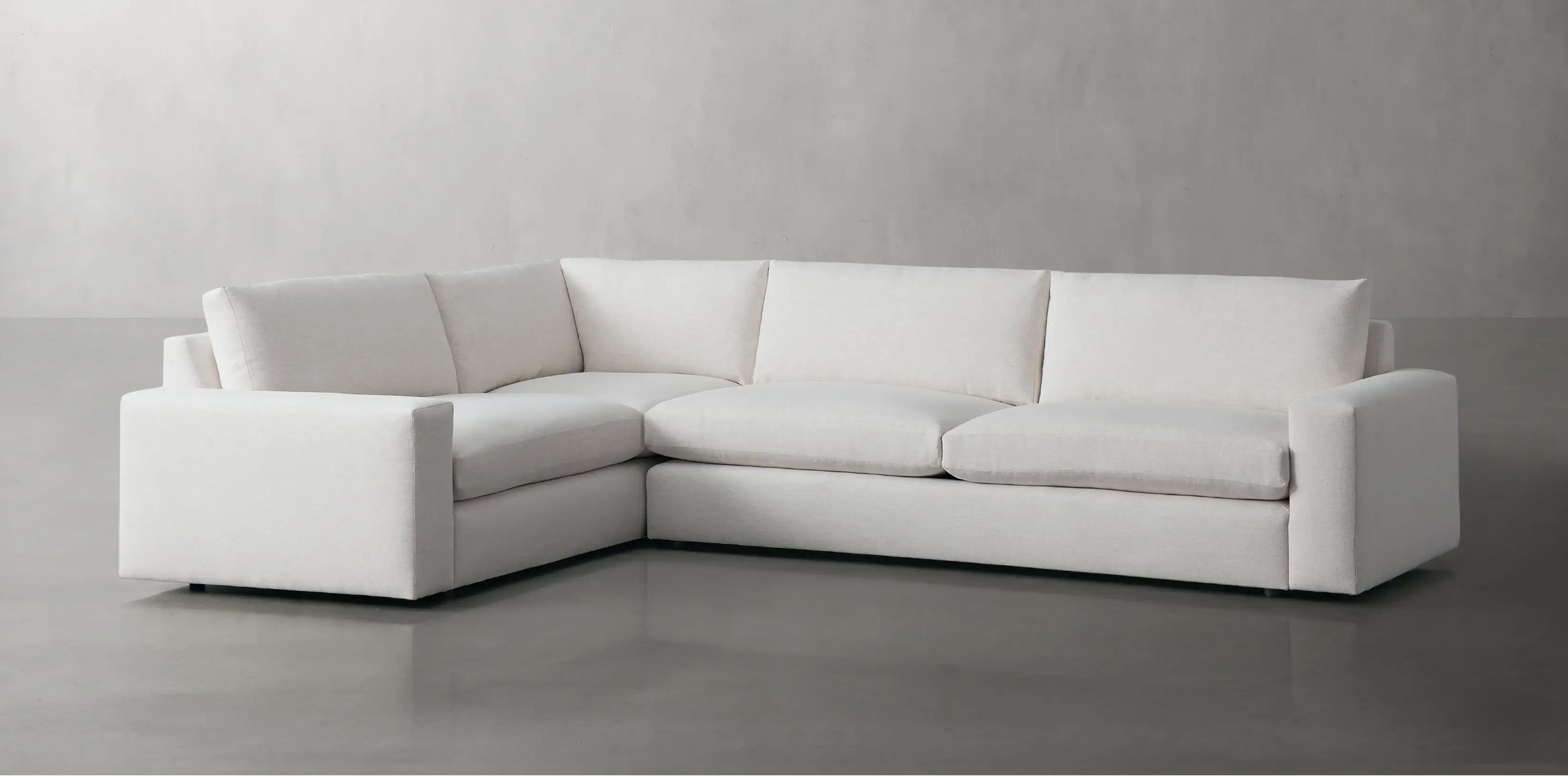Kipton Wide Arm Two-Piece Sectional in Upholstered Natural - Image 1