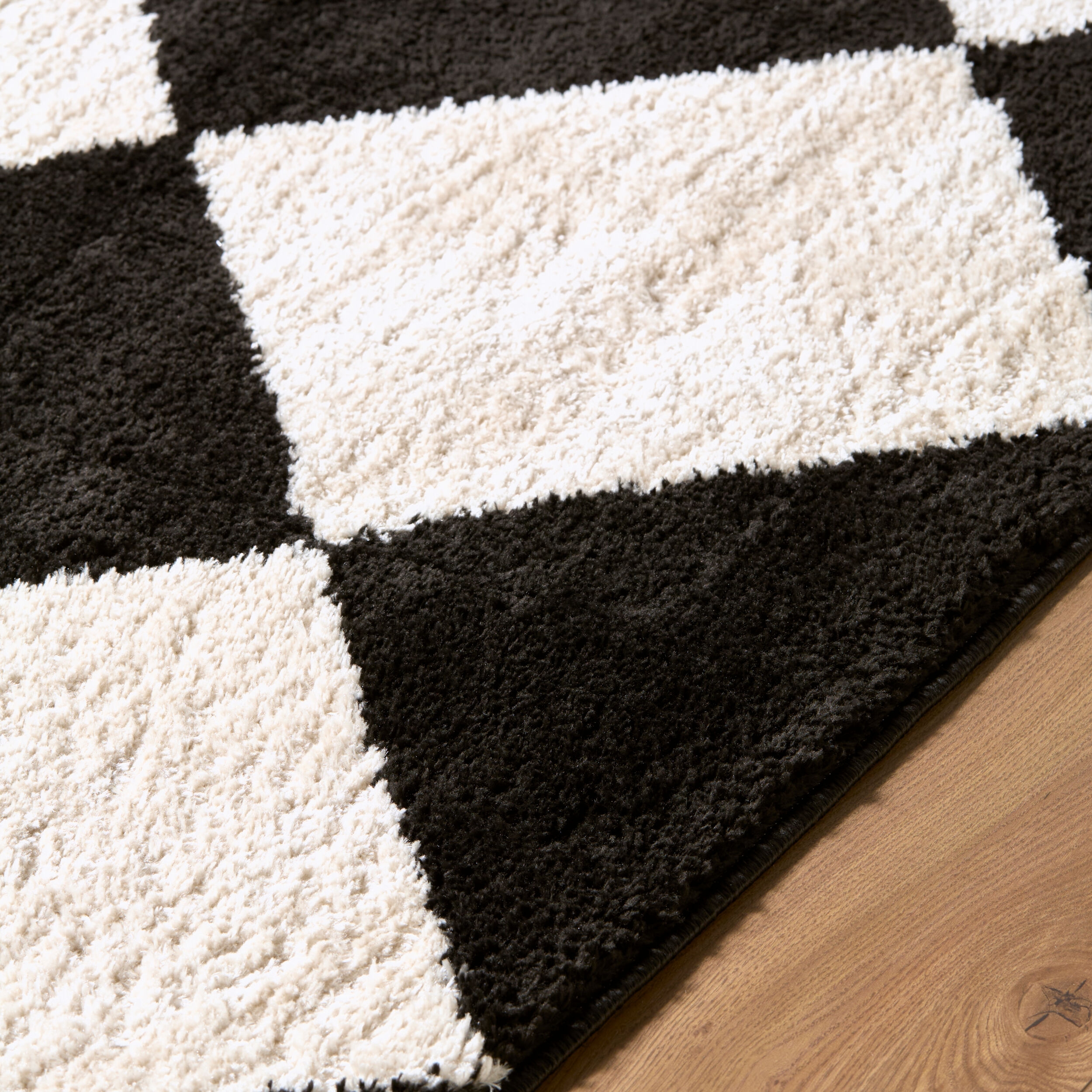 Rivoli Black Indoor 7'10" x 10' Machine Woven Rug - Image 2