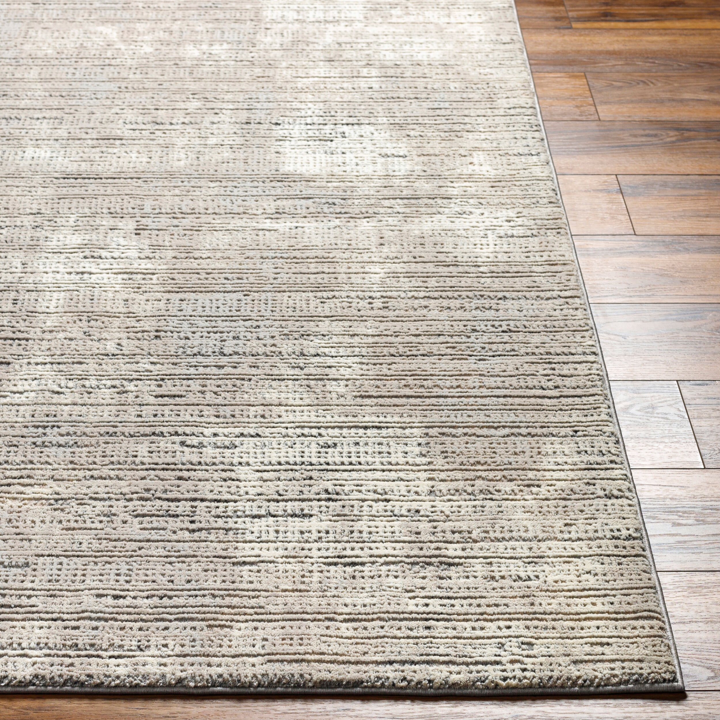 Alder Beige Indoor 6'4" x 9' Machine Woven Rug - Image 1