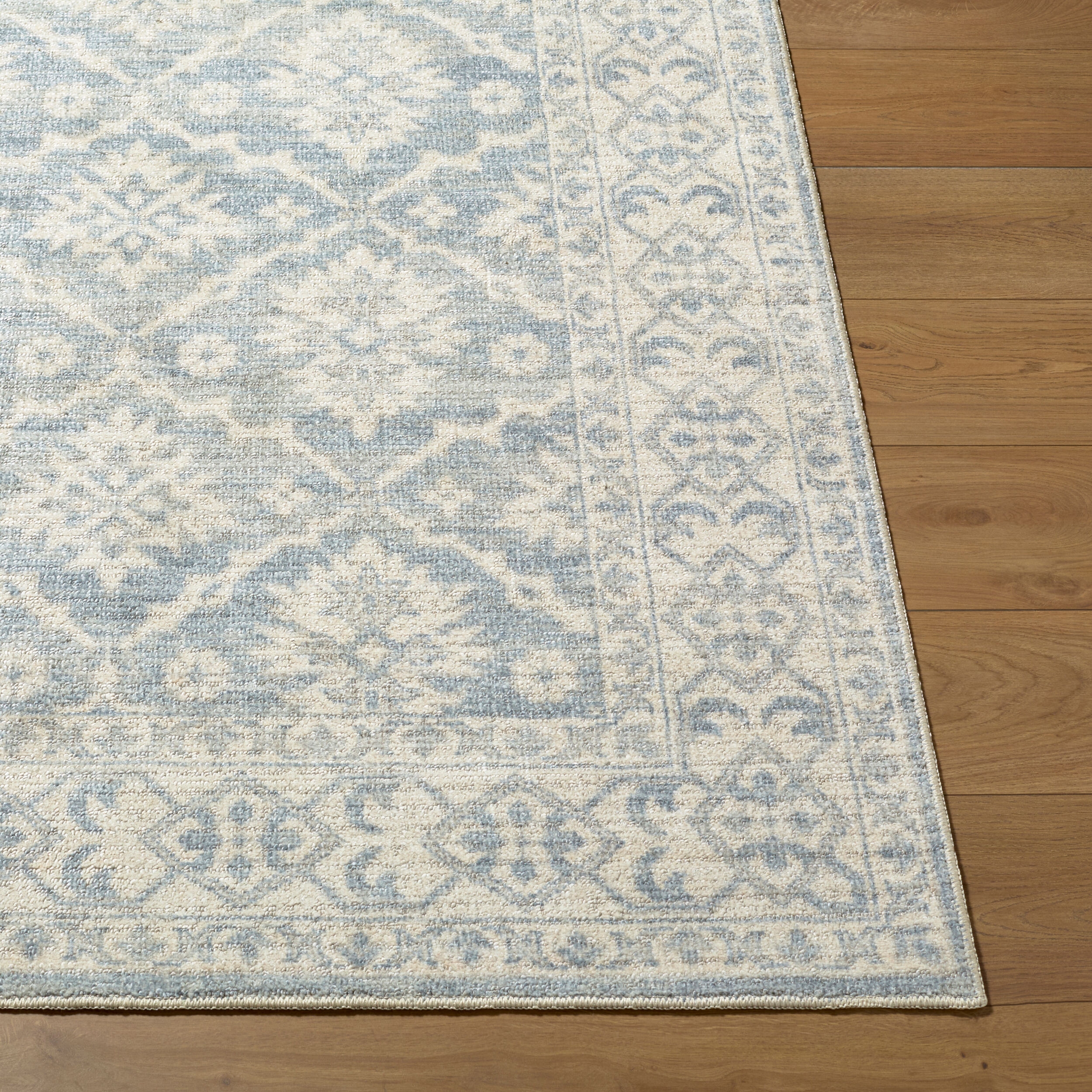 Aram Blue Indoor 7'9" x 10' Machine Woven Rug - Image 1