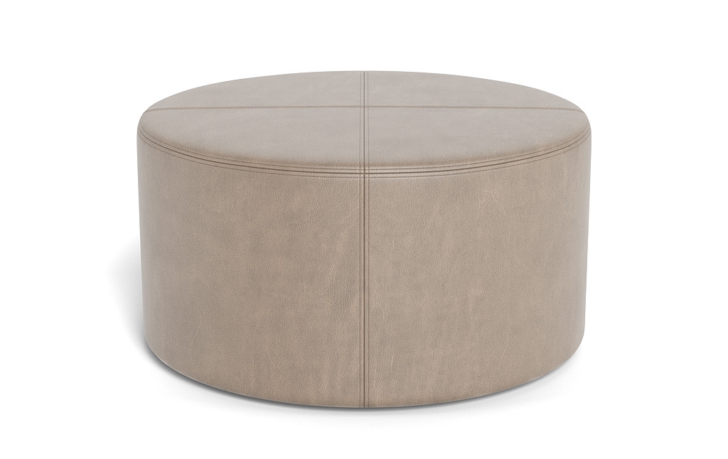 Colten Leather Round Coffee Table Ottoman - Image 0