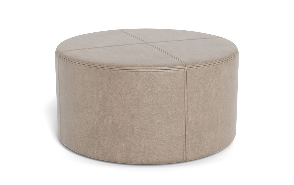 Colten Leather Round Coffee Table Ottoman - Image 1