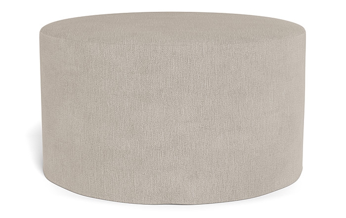 Dixon Slipcovered Round Ottoman - Image 0