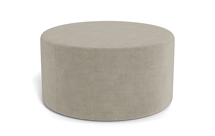 Colten Round Coffee Table Ottoman - Image 1