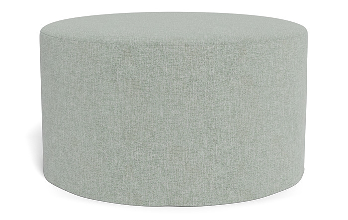 Dixon Slipcovered Round Ottoman - Image 0