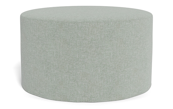 Dixon Slipcovered Round Ottoman - Image 1