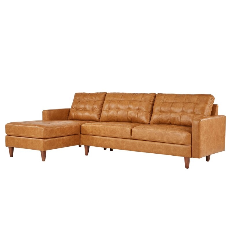 Nikolas 103.1" Wide Faux Leather Sectional - Image 1