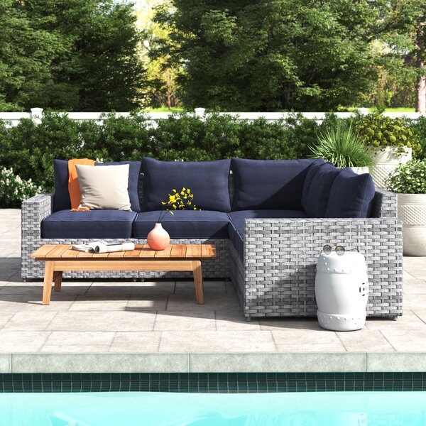 Kordell Patio Sectional with Cushions - Image 1