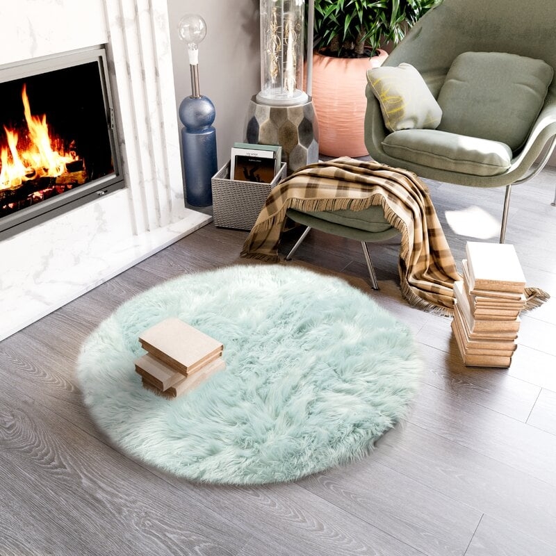 Dominick Handmade Shag Teal Area Rug - Image 0