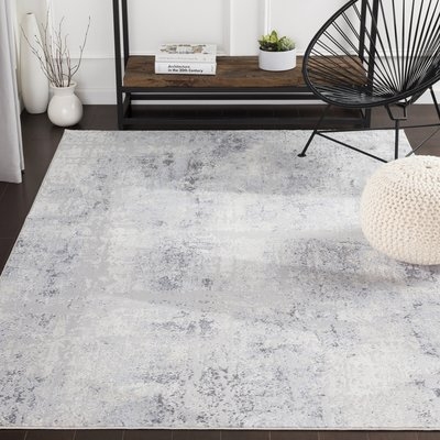 Heger Distressed Gray/White Area Rug - Image 1