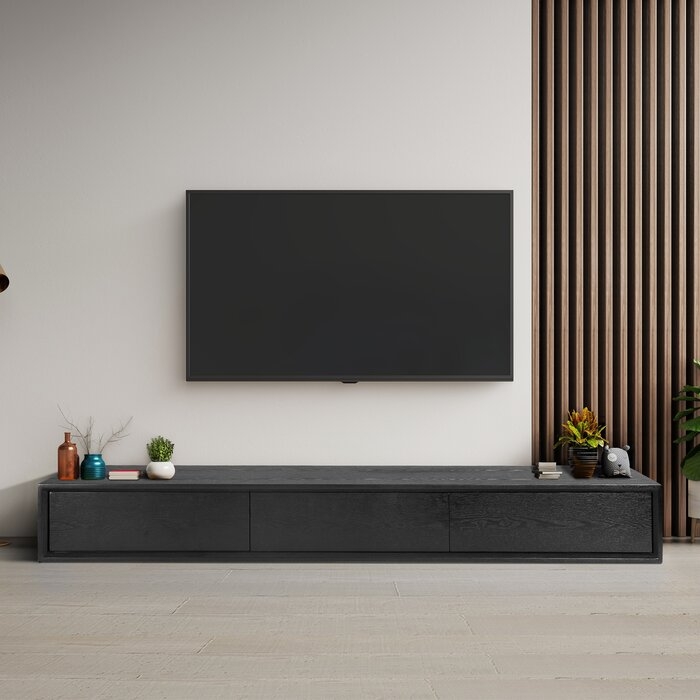 Harmonsburg TV Stand for TVs up to 85" in Black - Image 1